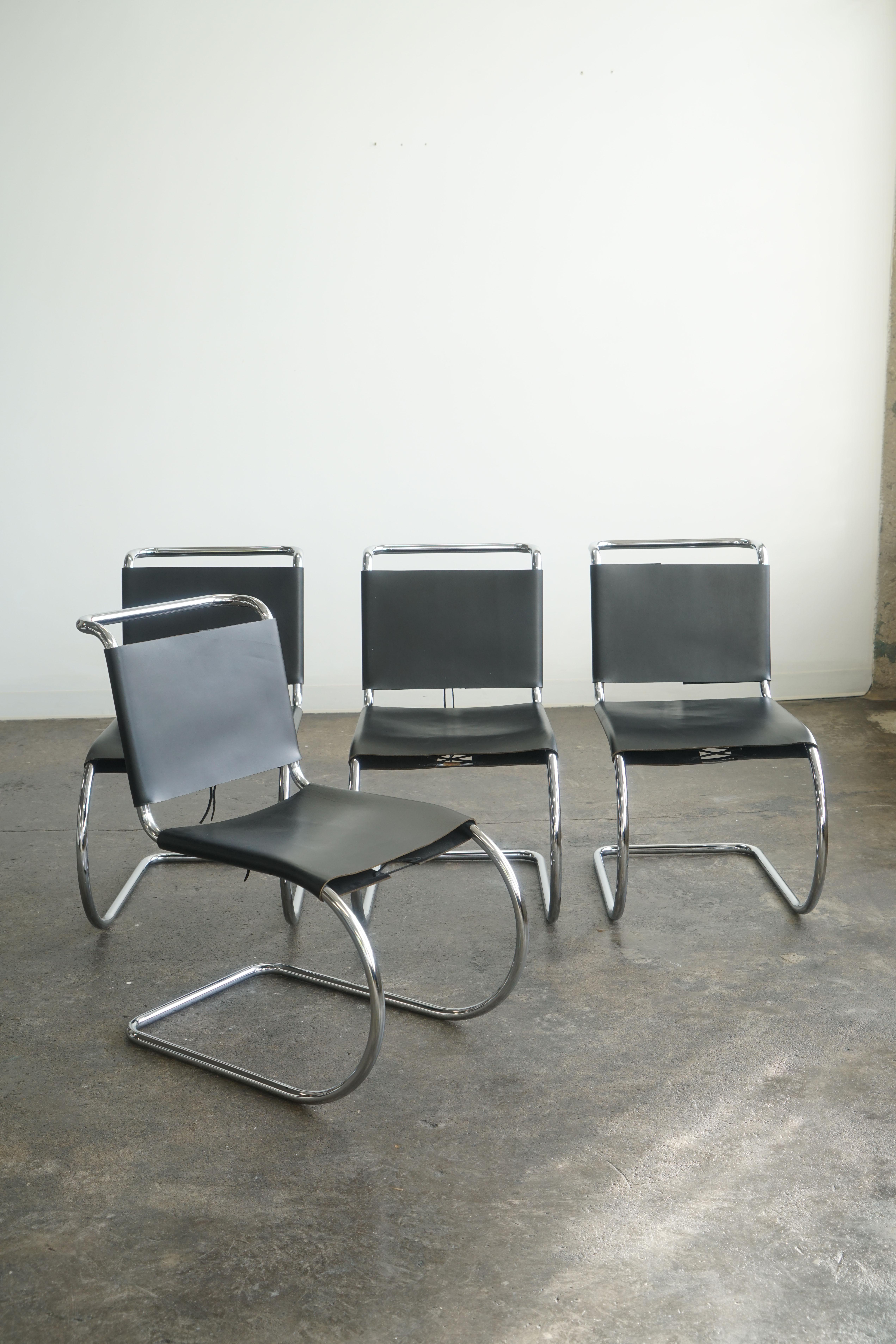 Set of 4 MR10 chairs by Mies van der Rohe for Knoll International. 
Black leather. 

Each chair retains 