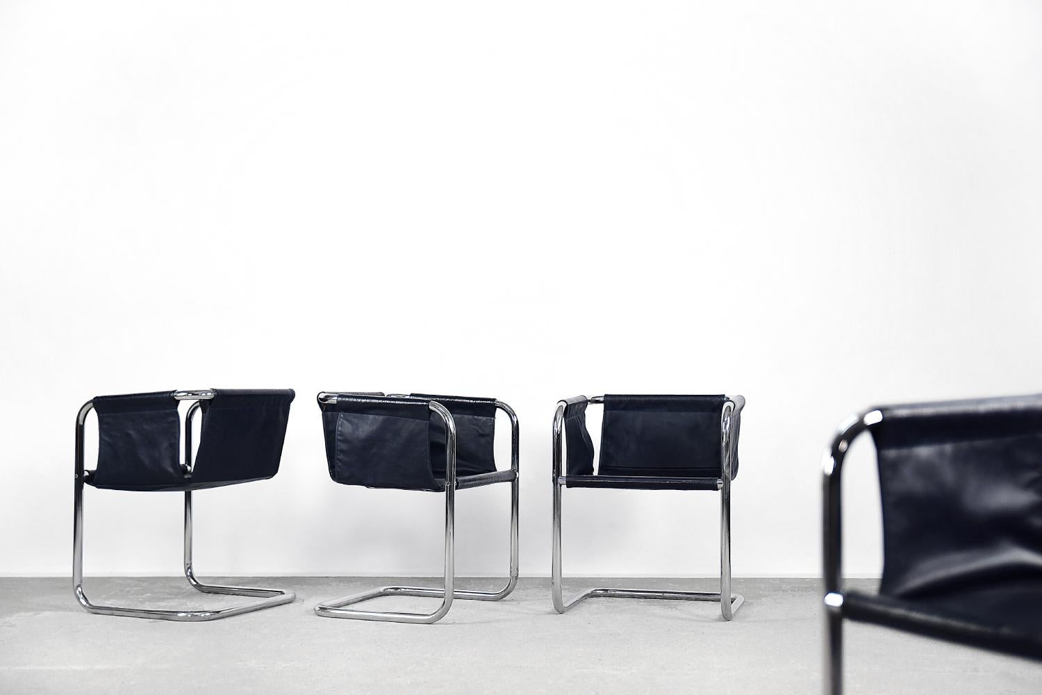 This set of four armchairs was made in the 1960s. Probably German production. The geometric, bent frame is made of chrome-plated tubular steel. A simple backrest with armrests and a bucket seat is a light and simple structure. The pads of natural