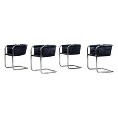 Set di 4 poltrone minimaliste Bauhaus in acciaio tubolare cromato e pelle blu