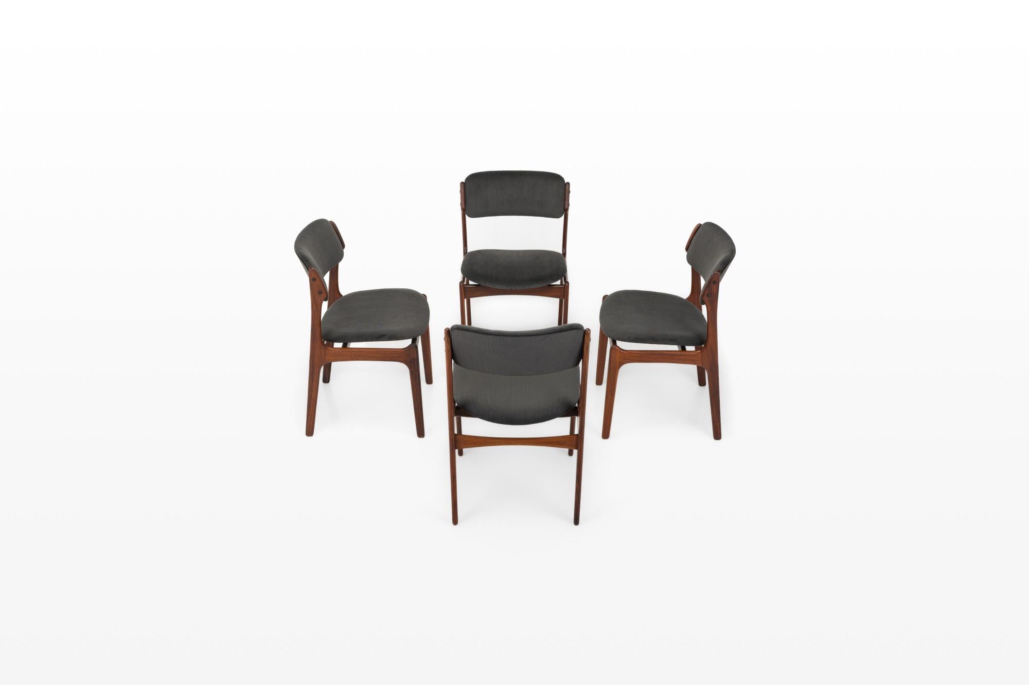 Set of four 'Model 49' dining chairs designed by Erik Buch for O.D. Møbler, Denmark 1960s. The chairs have a rosewood frame and are reupholstered with dark grey corduroy fabric.
