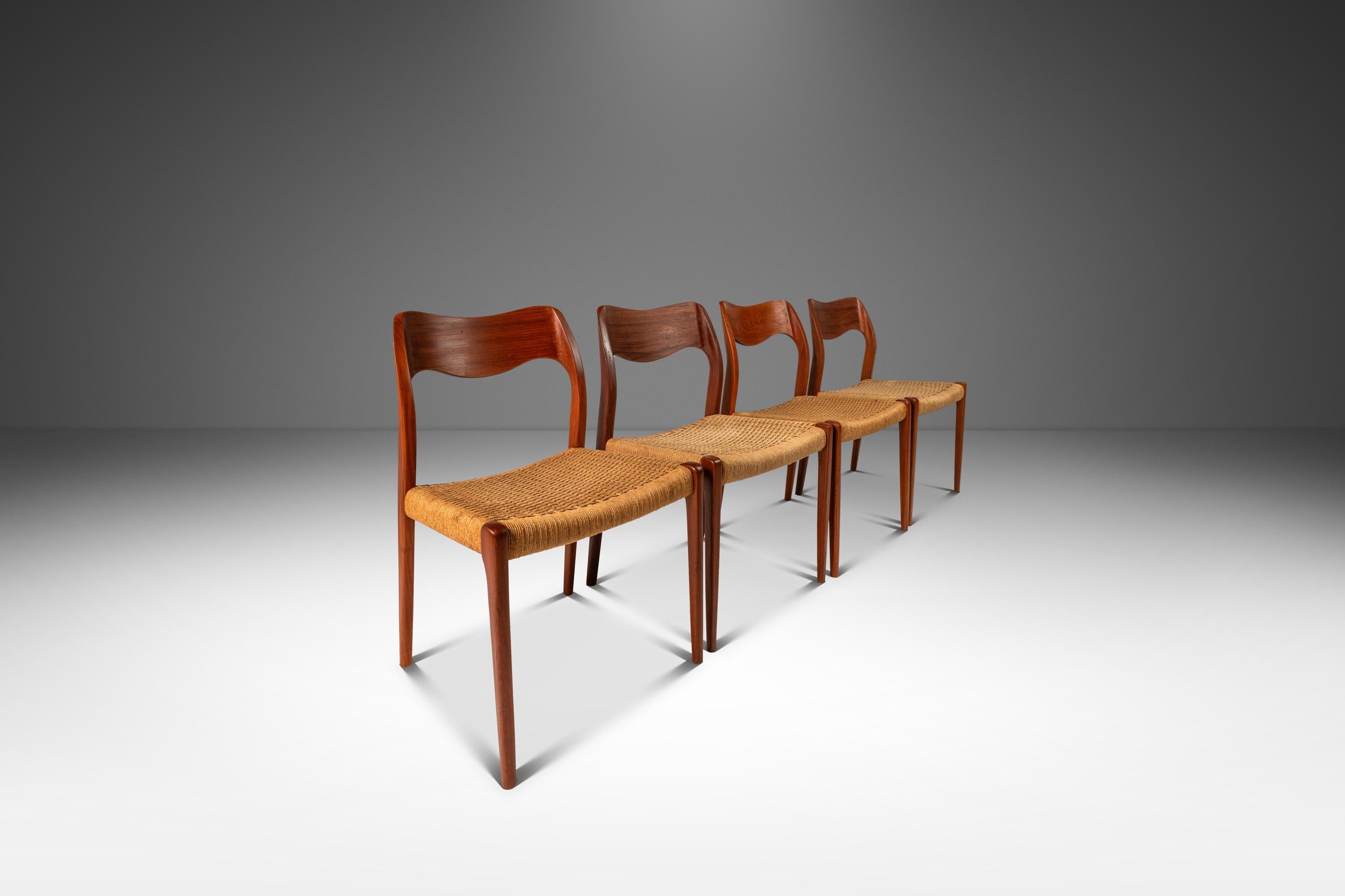  A timeless example of Danish craftsmanship, this set of four Møller Model #71 dining chairs embodies the refined design sensibilities of Niels Møller for J.L. Møllers Møbelfabrik. Crafted from rich teak, the chairs feature elegantly tapered legs