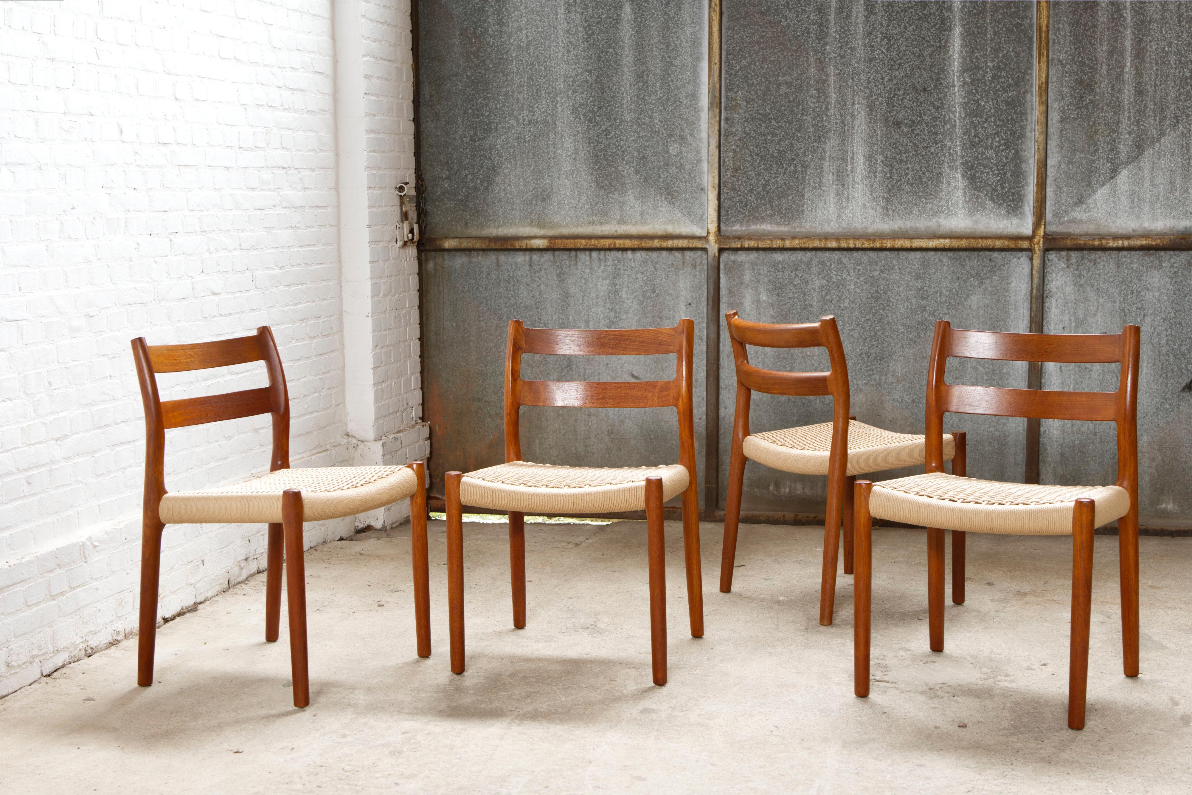 A beautiful organically shaped set of 4 dining chairs by Niels Otto Møller, 'model 84' in teak. The chairs are a well-known Danish classic by furniture designer and maker Niels Otto Møller.

This set has beautifully wood grain and is fitted with