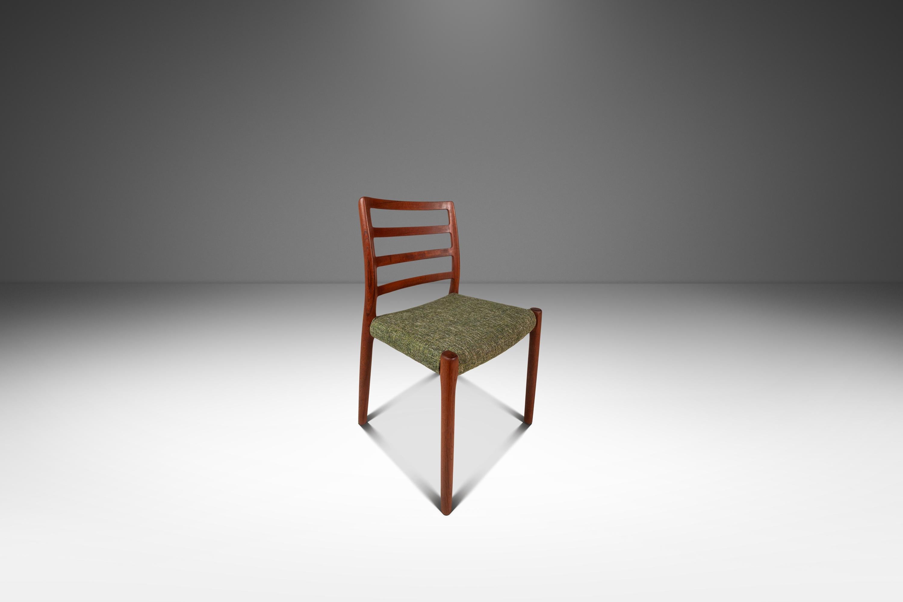 Introducing a fully restored limited set of four Model 85 ladderback side chairs designed by the incomparable Niels Møller for J.L. Møllers Møbelfabrik and crafted in the 1960s in Denmark. This stunning set is constructed from solid Burmese teak,