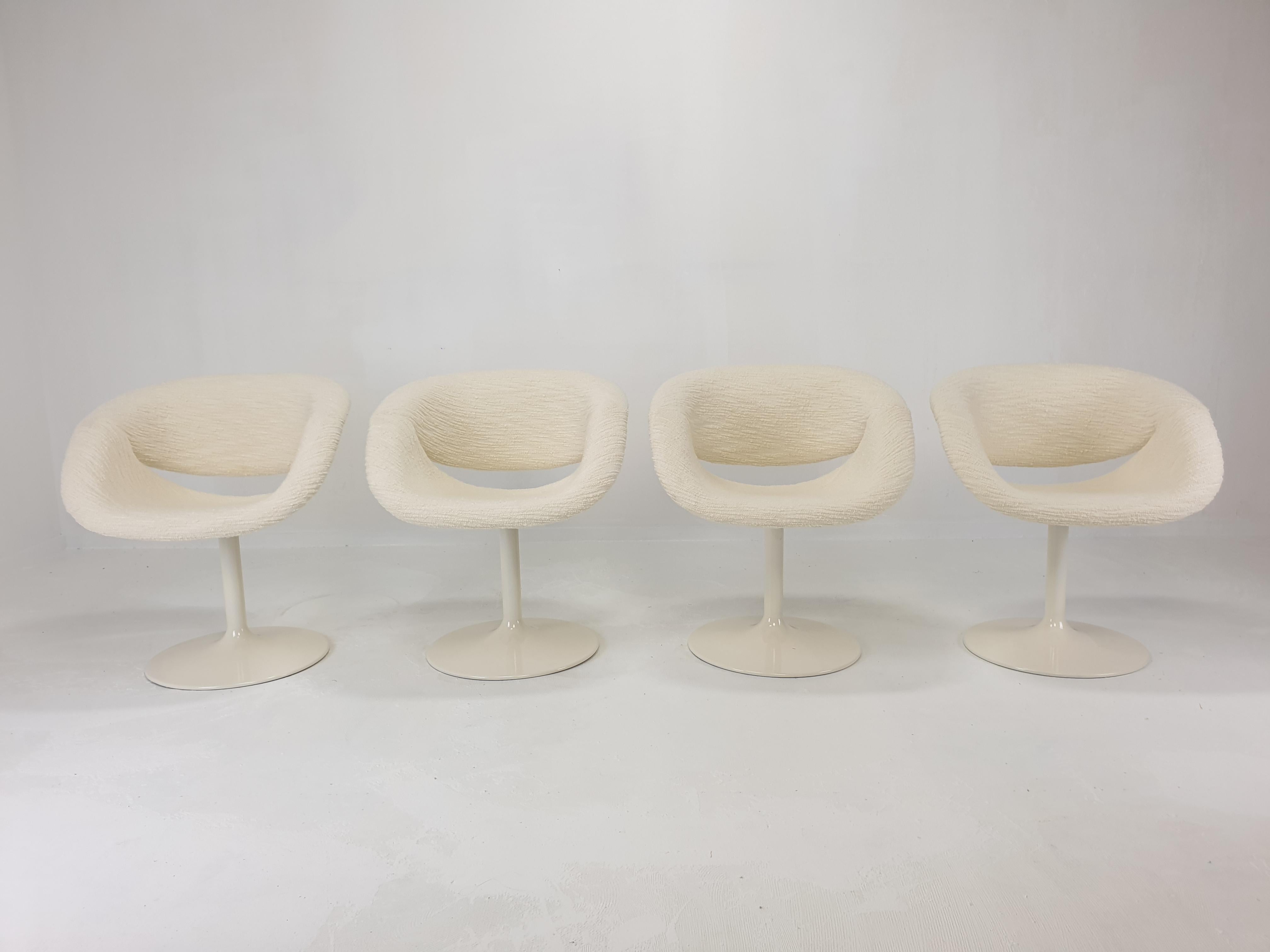 Set of 4 very rare model 8762 Chairs.
These comfortable armchairs were designed by the famous Pierre Paulin in the 60's. 
They are fabricated by Artifort, just for a very short period. 

Solid steel base with a pivoting wooden frame. 
The