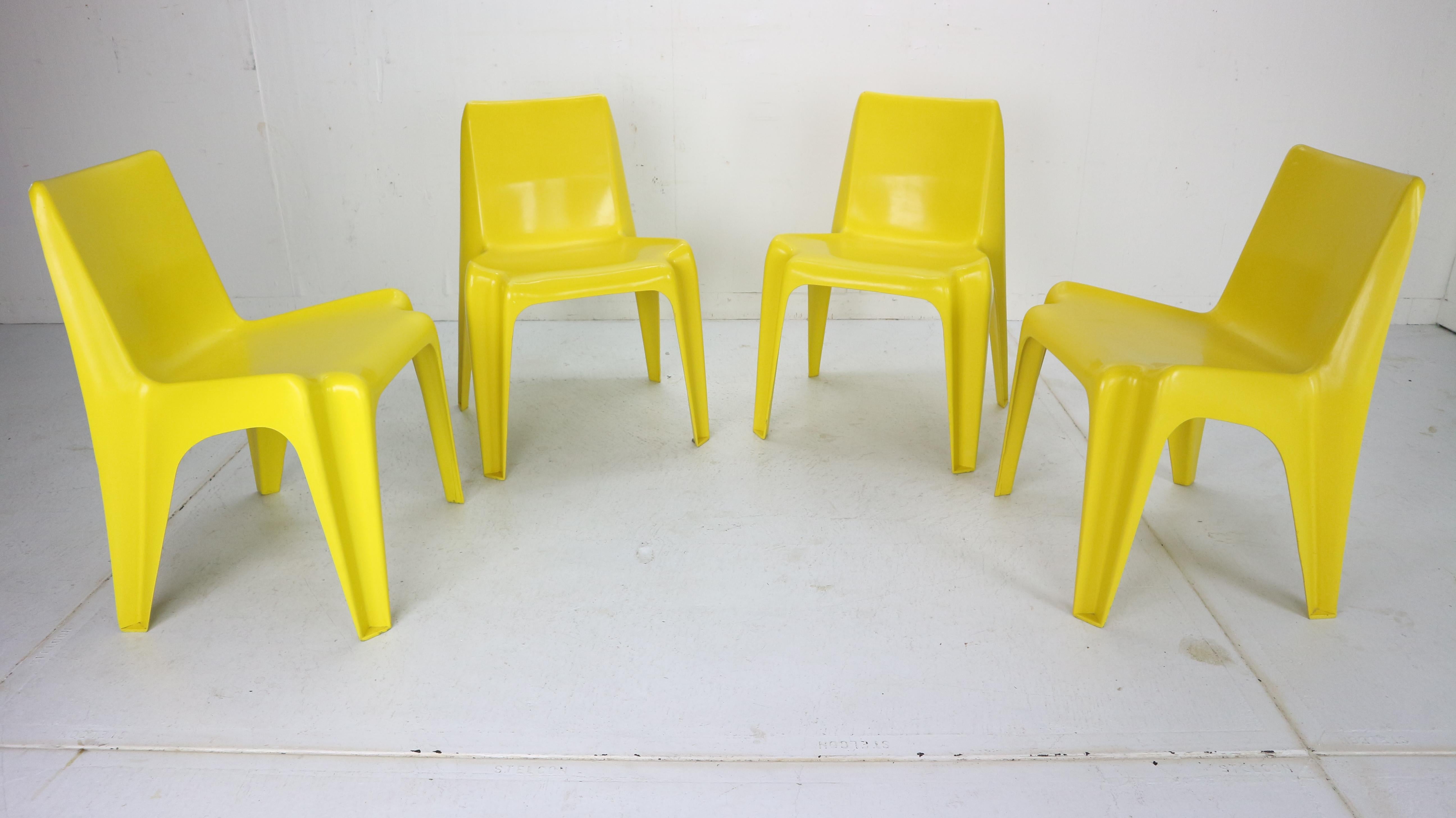 Set of 4 chairs (model BA 1171) were designed by architect and designer Helmit Bätzner in 1964 in close co-operation with the Bofinger company in Germany. The stackable so-called Bofinger chairs was the first one-piece plastic chair in fiberglass-