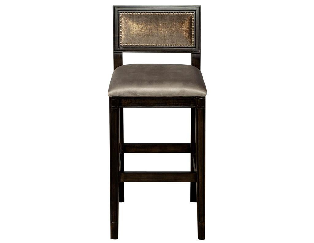 Set of 4 modern counter stools. Finished in a deep espresso color with contrasting fabric. Featuring sleek carved design with head to head nails.
Price includes complimentary curb side delivery to the continental USA.