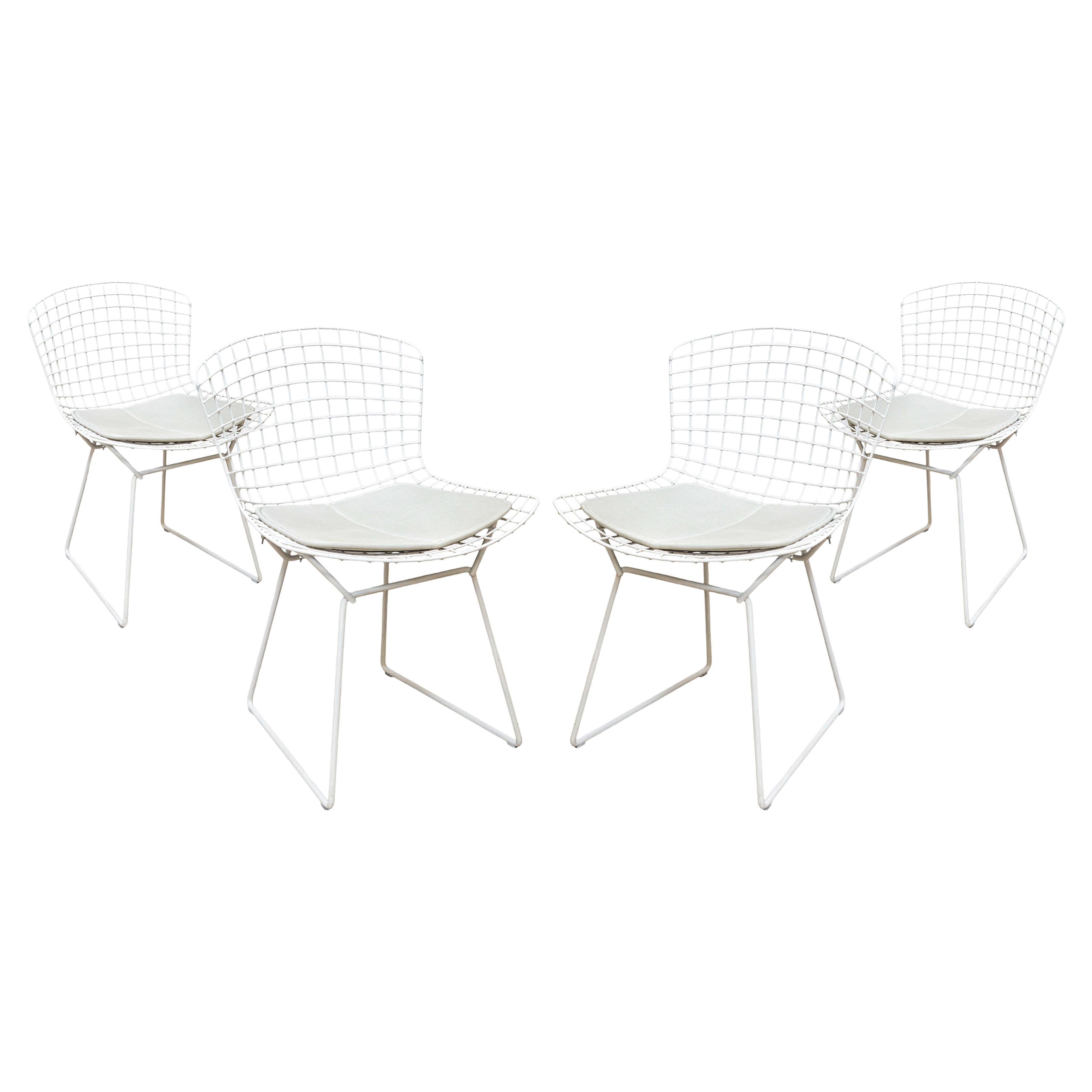 Set of 4 Modern Harry Bertoia White Side Chairs with Vinyl Seat Pads For Sale