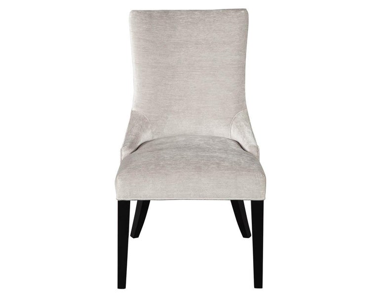 Set of 4 modern side chairs in textured gray fabric opus chairs. Part of the Carrocel custom collection named the Opus chair for its sleek curved shape and modern design. Featuring soft to the touch textured gray fabric with dark espresso satin