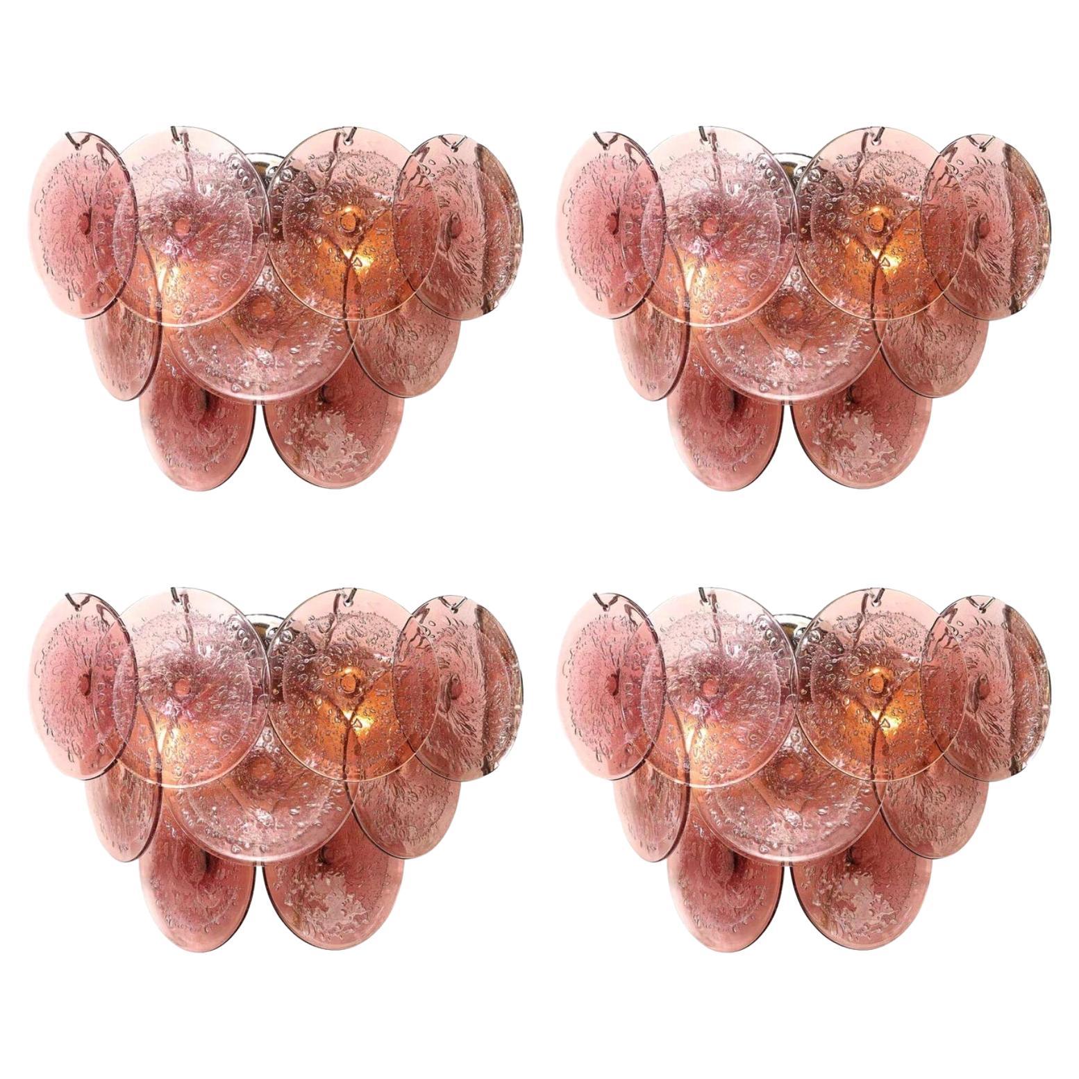 Ensemble de 4 appliques modernistes à 9 disques en verre soufflé de Murano fumé à l
améthyste