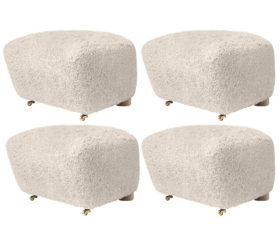 Set of 4 moonlight natural oak sheepskin the tired man footstools by Lassen
Dimensions: W 55 x D 53 x H 36 cm
Materials: Sheepskin

Flemming Lassen designed the overstuffed easy chair, the tired man, for The Copenhagen Cabinetmakers’ Guild
