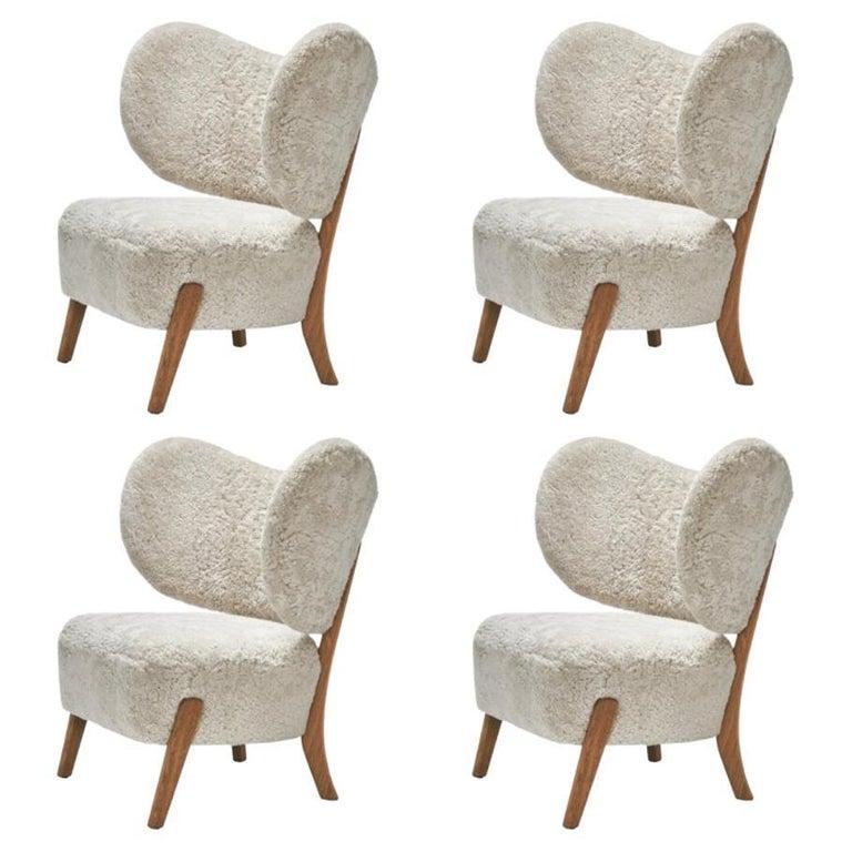 Set of 4 Moonlight Sheepskin TMBO Lounge Chairs by Mazo Design
Dimensions: W 90 x D 68.5 x H 87 cm
Materials: Oak, Sheepskin.
Also Available: ROMO/Linara, DAW/Royal, KVADRAT/Remix, KVADRAT/Hallingdal & Fiord, BUTE/Storr, DEDAR/Linear,
DAW/Mohair