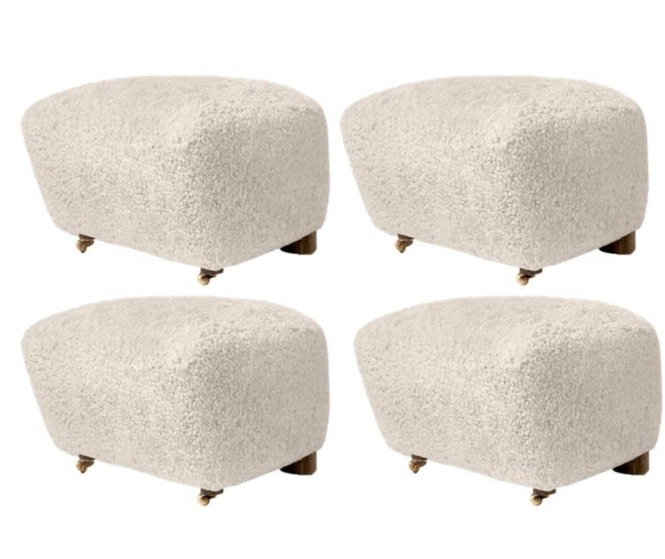 Set of 4 moonlight smoked oak sheepskin the tired man footstools by Lassen
Dimensions: W 55 x D 53 x H 36 cm 
Materials: Sheepskin

Flemming Lassen designed the overstuffed easy chair, The Tired Man, for The Copenhagen Cabinetmakers’ Guild