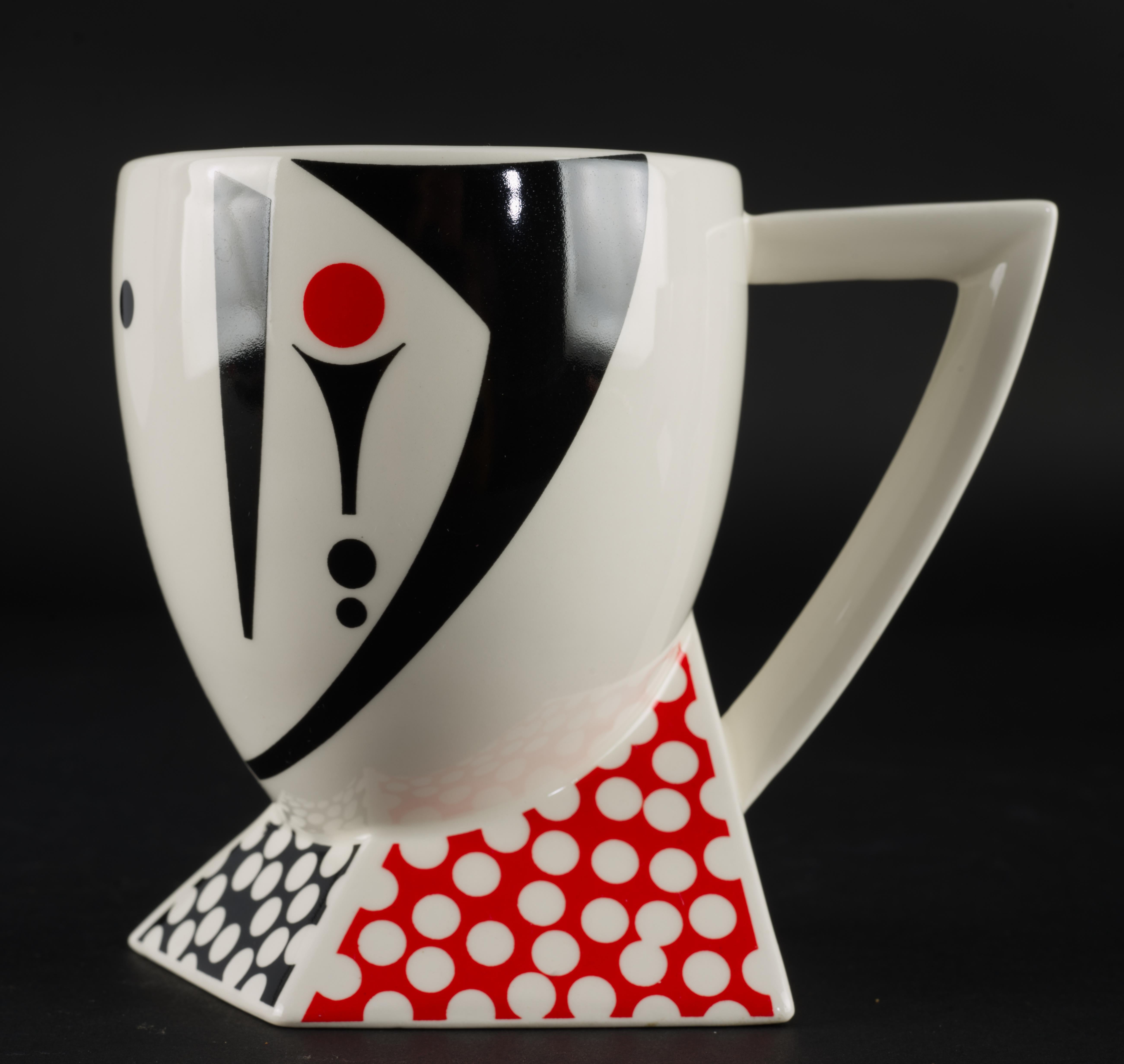 Set of 4 mugs in Alpha 3 pattern was designed by Kaneaki Fujimori for Kato Kogei Japan in 1980s. Alpha 3 series consists of mugs, salad/casual plates, and decorative serving platter. All 4 mugs in the set are decorated with different, highly