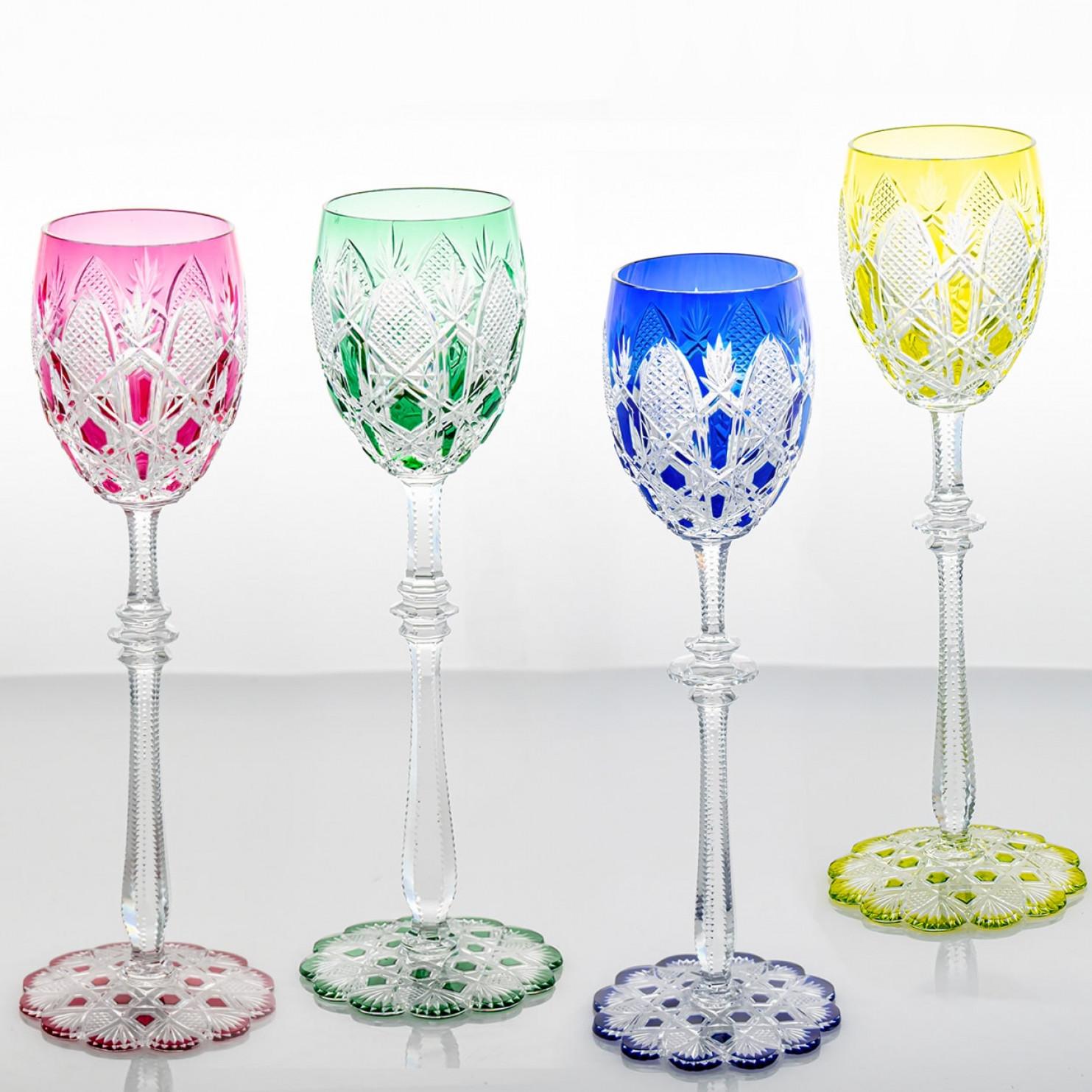 Luxury at its finest, set of 4 high-end drink glasses in multicolor crystal by Baccarat.

This exquisite set of Baccarat glassware embodies the timeless elegance and refined craftsmanship for which the French crystal house is renowned. Each glass,