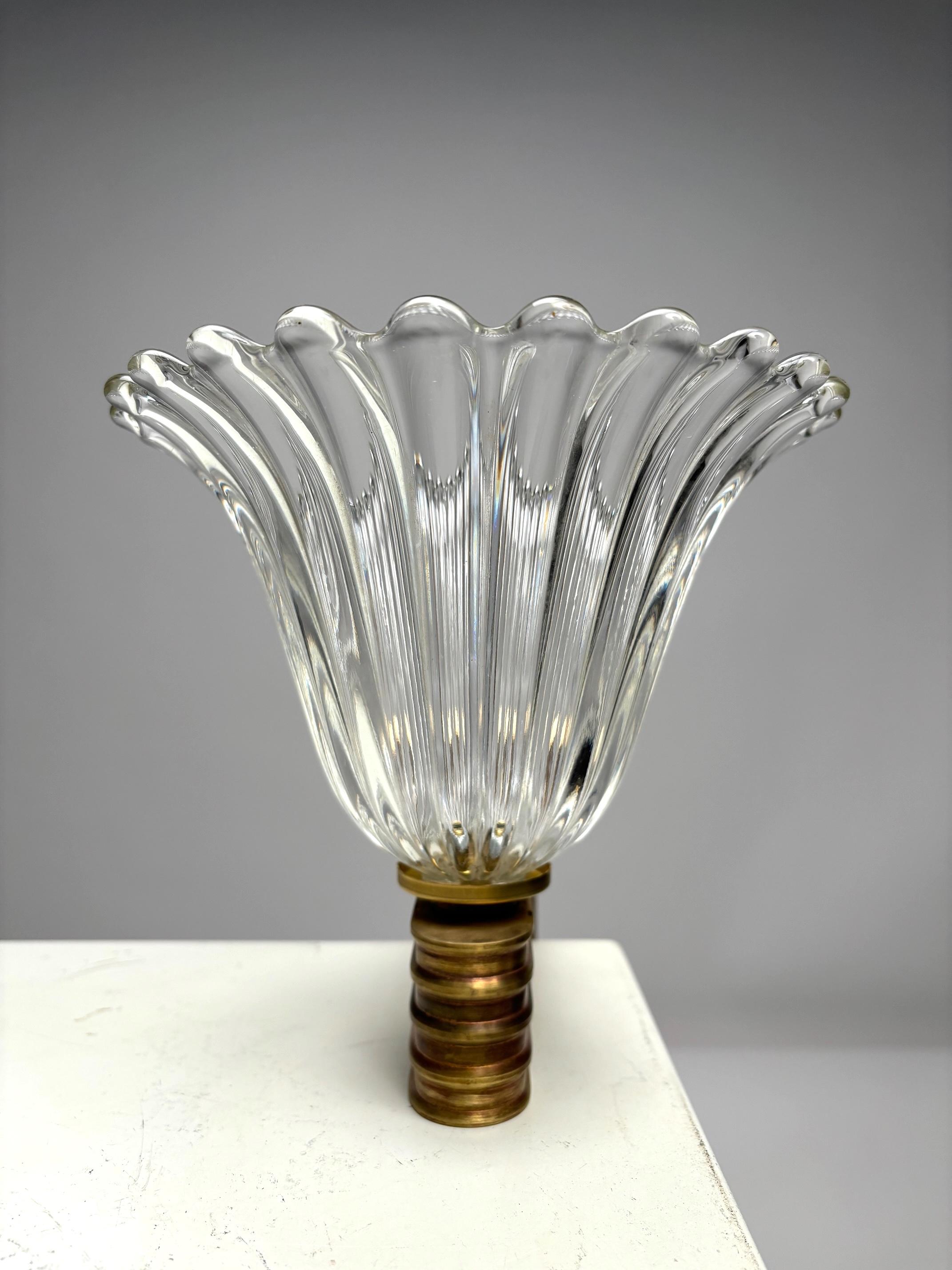 Set of 4 Murano glass wall lamps by Ercole Barovier, Italy, 1940s

These lamps, designed by the renowned Italian glass master Ercole Barovier, are made of thick blown glass; when held against the light, you can clearly see the bubbles typical of the