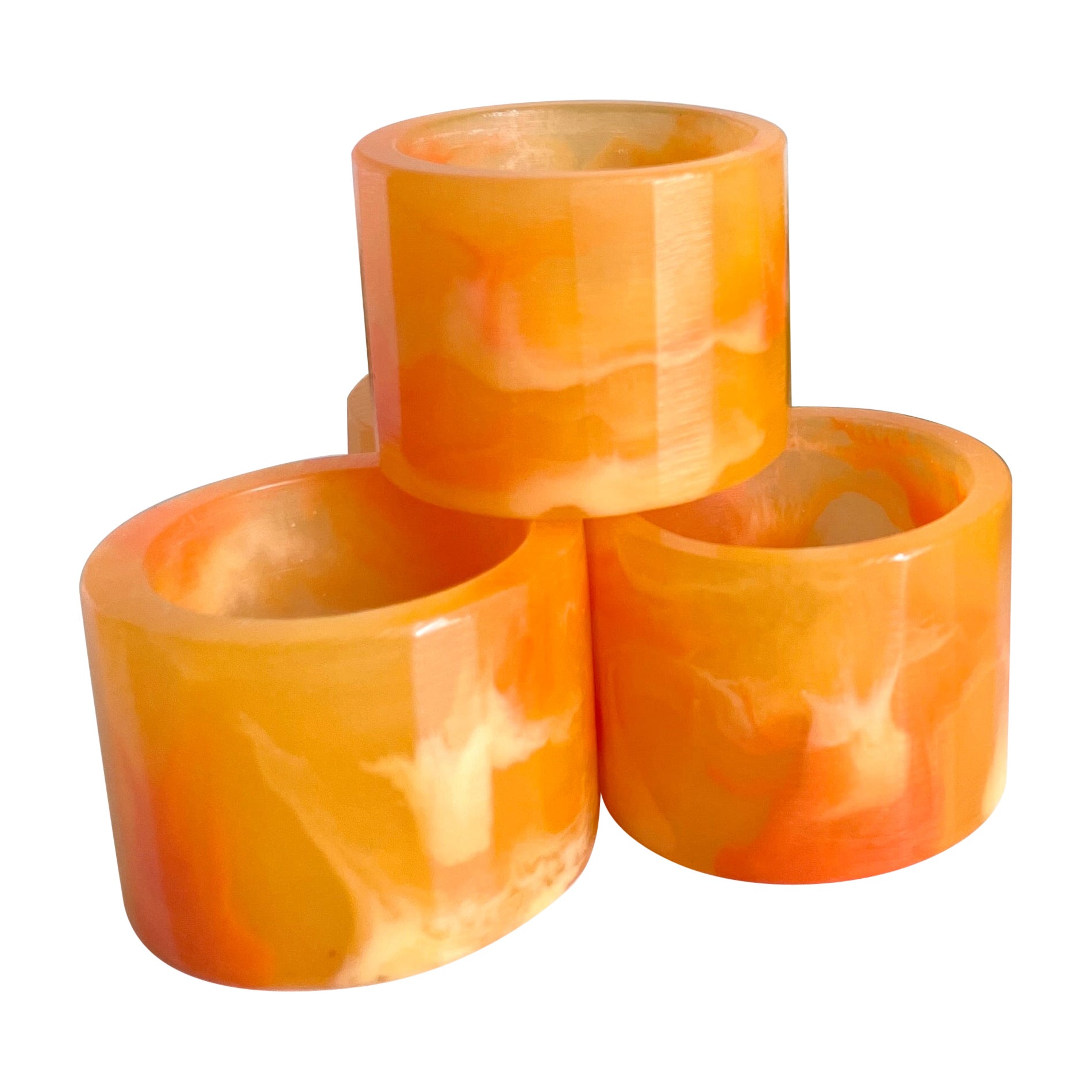 Ensemble de 4 anneaux de serviette en résine orange tourbillonnante de Paola Valle