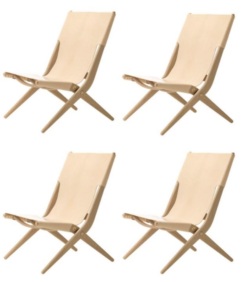 Set of 4 natural oak and natural leather Saxe chairs by Lassen.
Dimensions: W 60 x D 67 x H 84 cm. 
Materials: Leather, Oak.

Mogens Lassen was perceived as ‘the naughty boy in class’, but he aimed for perfection in each design project. His eye