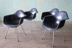 Set of 4 Navy Blue Fiberglass Eames Shell Armchairs for Herman MIller c. 1960s