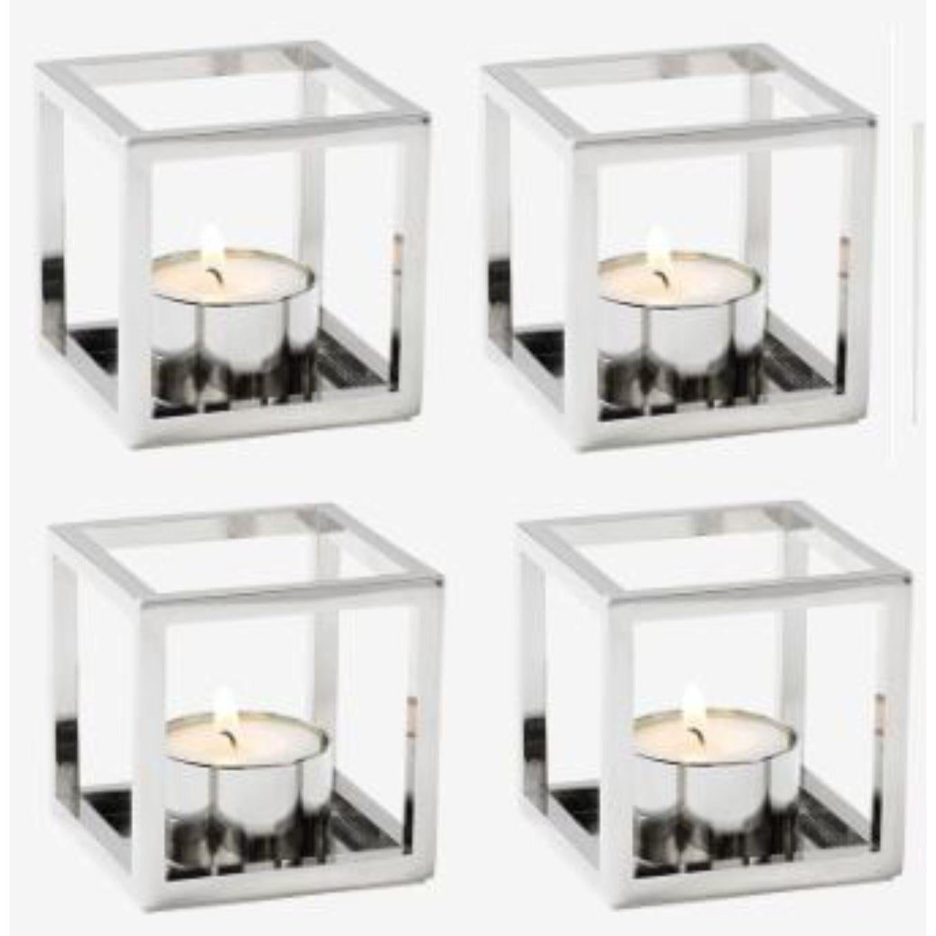Set of 4 nickel plated Kubus T candle holders by Lassen
Dimensions: D 7 x W 7 x H 7 cm 
Materials: Metal 
Also available in different dimensions and colors. 
Weight: 0.40 Kg

The tealight, Kubus T, is added to the Kubus collection in 2018,