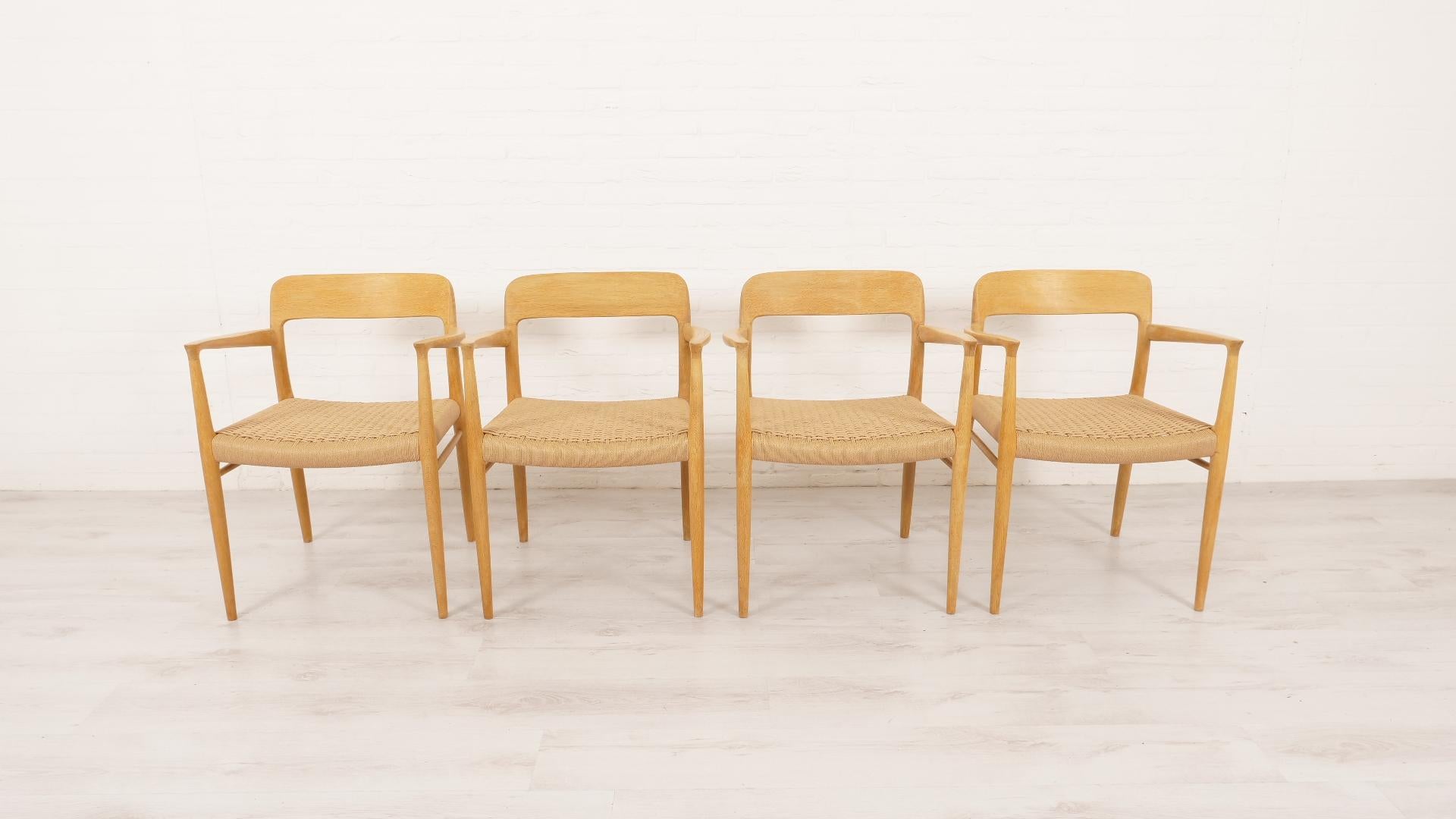 Set of 4 beautiful vintage dining chairs. These chairs were designed by Niels Otto Møller, model 56. The chairs are finished in oak and fitted with new Danish Papercord. The frames of the chairs have been refinished with Danish soap.

Design period: