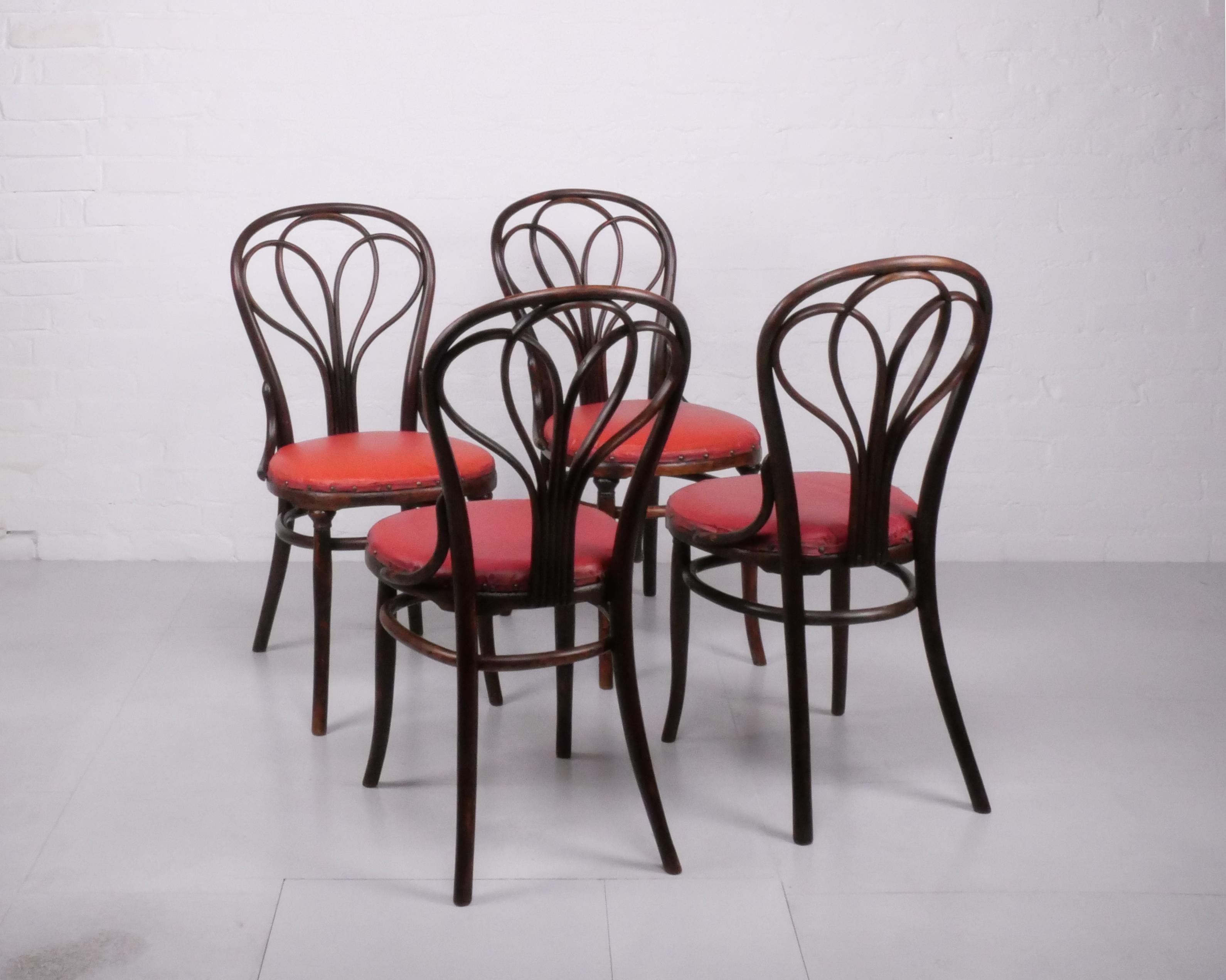 Gebrüder Thonet (Manufacturer), Austria

Thonet no. 25 dining chair, set of 4, produced from c. 1875 to 1911.

Bentwood frames with original dark finish, period upholstered seats

This is a beautiful, rare set of one of the most sought after early