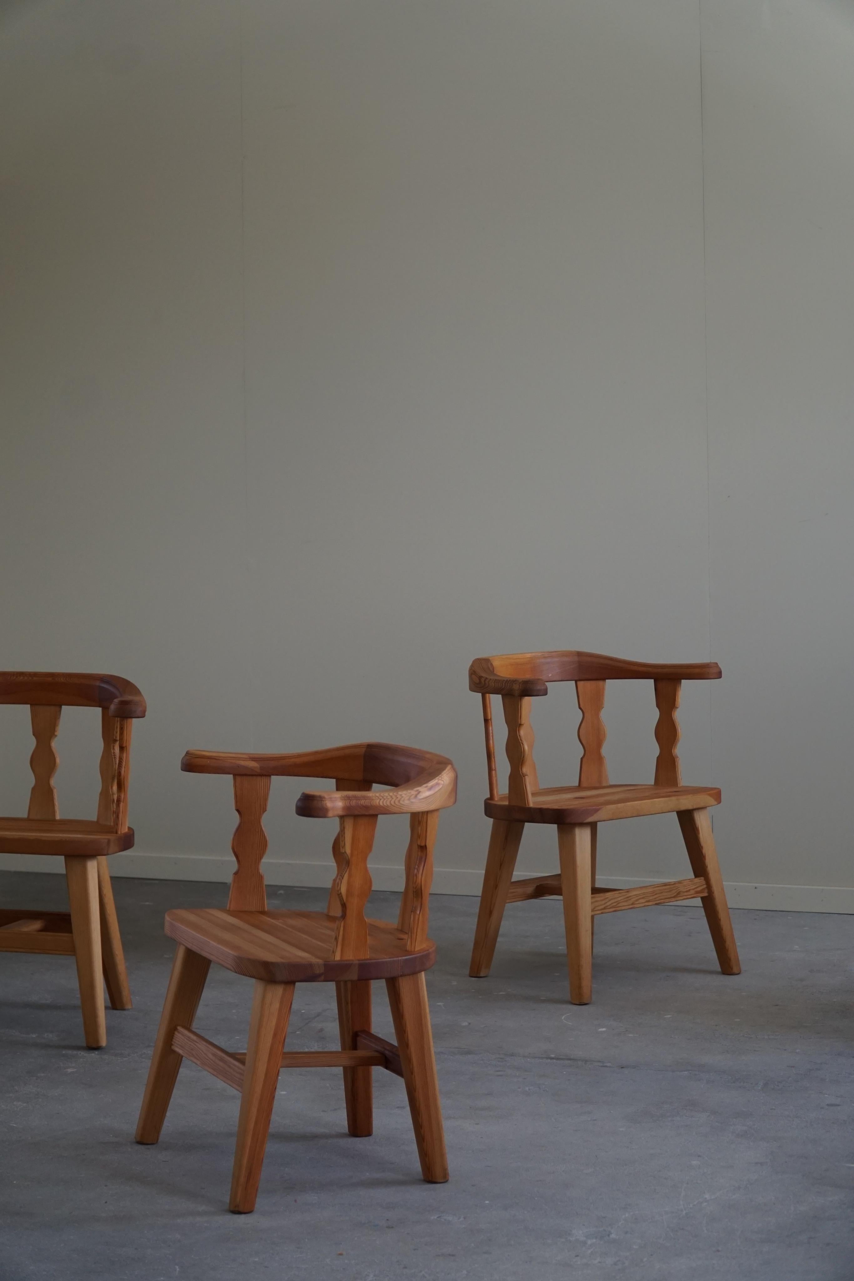 A set of 4 charming brutalist armchairs in solid pine. Made in Norway by Krogenæs in the 1950-1960s. 

These sculptural dining chairs have a really strong impression that pairs well with many types of interior styles. A Modern, Scandinavian, Classic