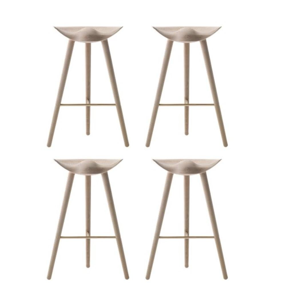 Set of 4 oak and brass bar stools by Lassen
Dimensions: H 77 x W 36 x L 55.5 cm
Materials: oak, brass

In 1942 Mogens Lassen designed the Stool ML42 as a piece for a furniture exhibition held at the Danish Museum of Decorative Art. He took