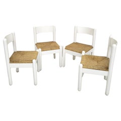 Vintage Set of 4 oak chairs  in the style of Charlotte Perriand  60's