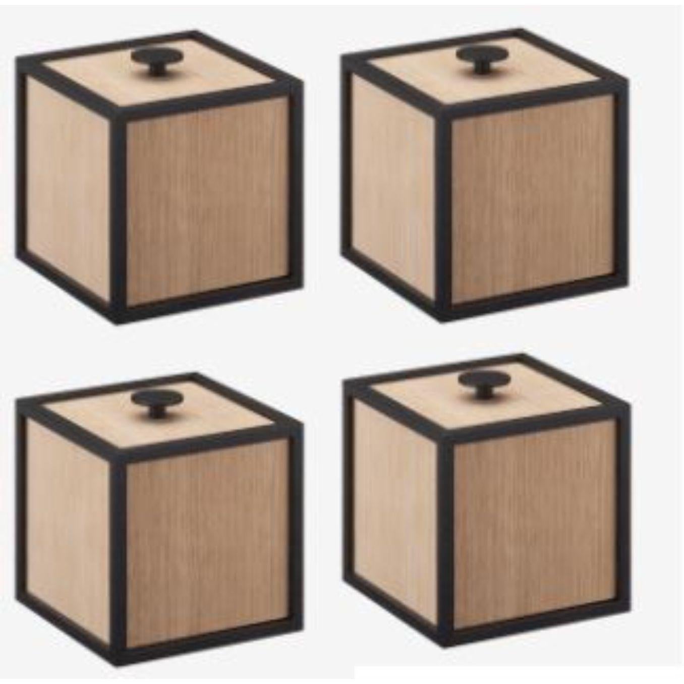 Set of 4 oak frame 10 box by Lassen
Dimensions: D 10 x W 10 x H 10 cm 
Materials: Finér, Melamin, Melamine, Metal, Veneer
Weight: 0.85 Kg

Frame box is a square box in a cubistic shape. The simple boxes are inspired by the Kubus candleholder by