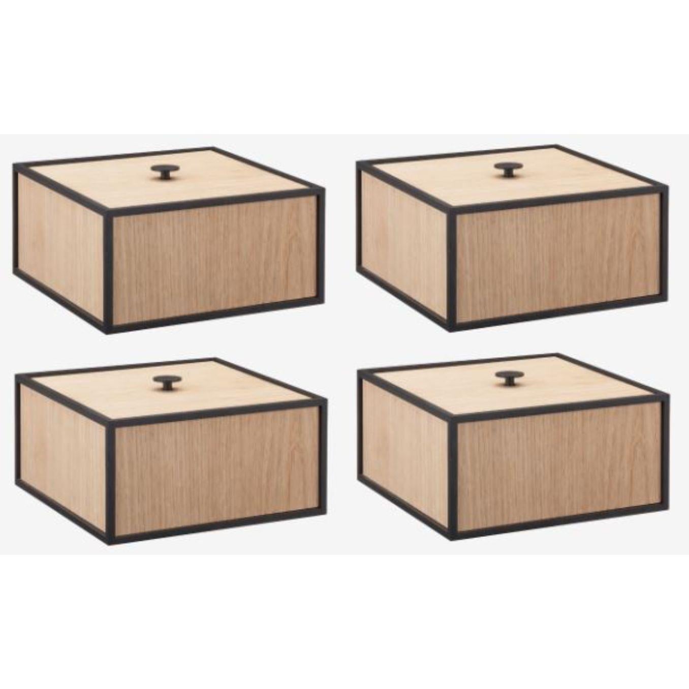 Set of 4 oak frame 20 box by Lassen
Dimensions: d 20 x w 20 x h 10 cm 
Materials: Melamin, Melamine, Metal, Veneer
Weight: 2.00 Kg

Frame box is a square box in a cubistic shape. The simple boxes are inspired by the Kubus candleholder by Mogens