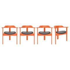 Satz von 4 orangefarbenen Haussmann-Sesseln von Robert & Trix Haussmann, Design 1964