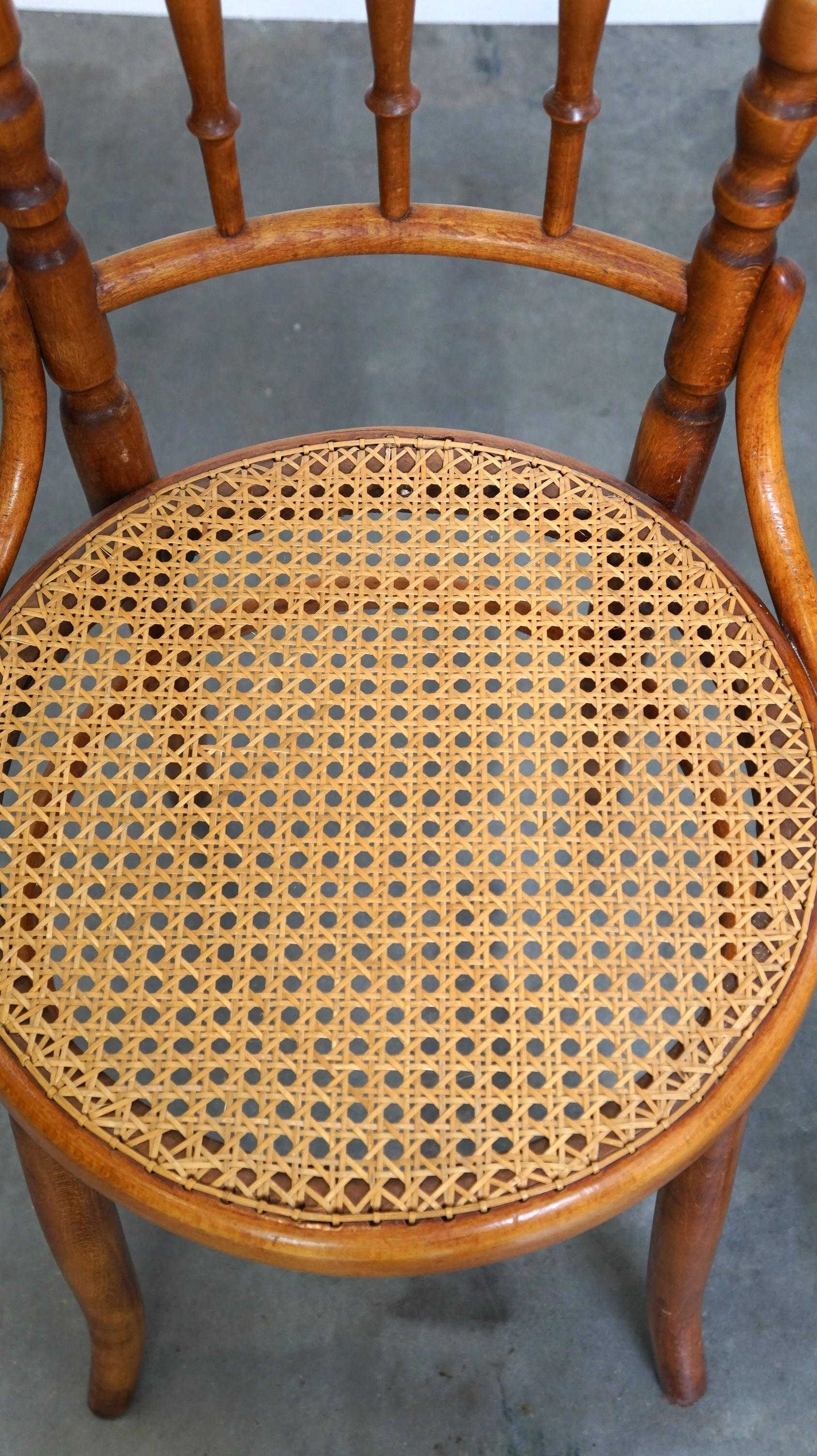 Rattan Set of 4 original and antique Thonet bistro chairs with a fantastic look For Sale