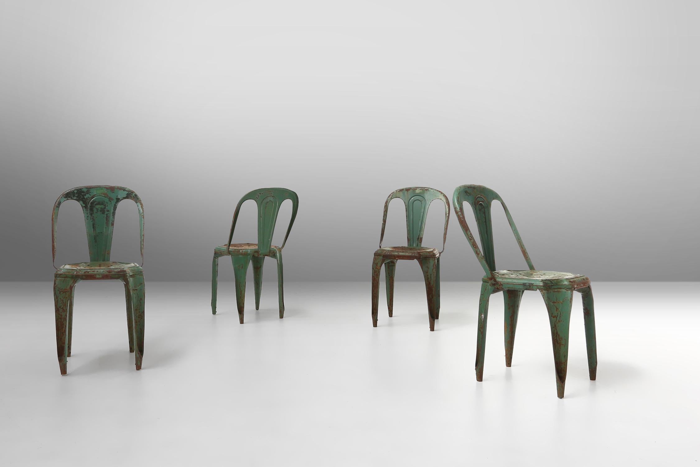 France / 1950 / set of 4 chairs / Tolix / model A / metal / industrial / mid-century / vintage

Set of 4 vintage Tolix chairs with original green lacquer, made in France around 1950. Created in 1927 by Xavier Pauchard. This set of iconic stackable
