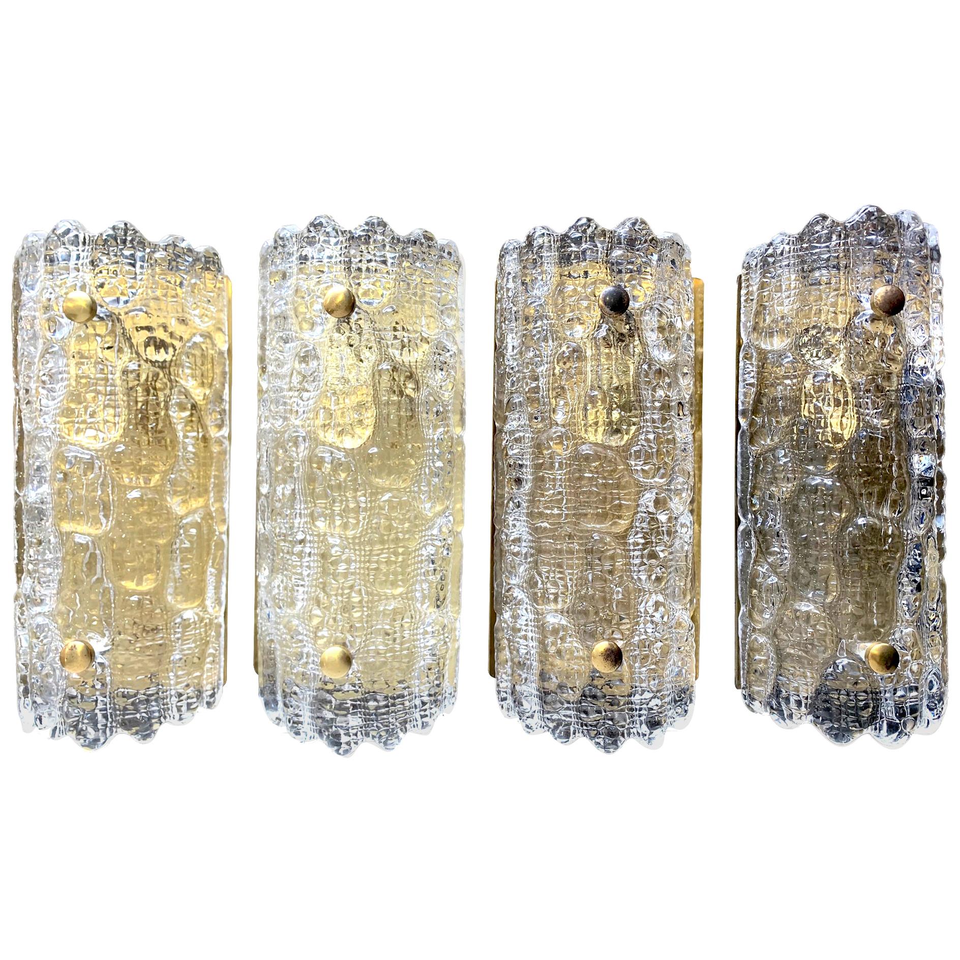 A pair of Orrefors Glass Wall Sconces with Brass Plates by Carl Fagerlund