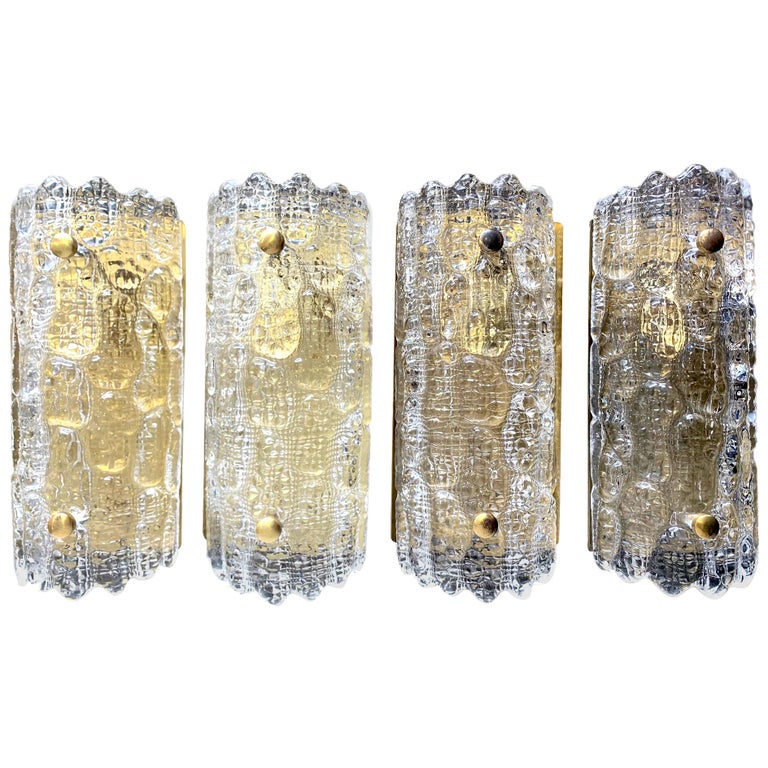 A pair of Orrefors Glass Wall Sconces with Brass Plates by Carl Fagerlund For Sale
