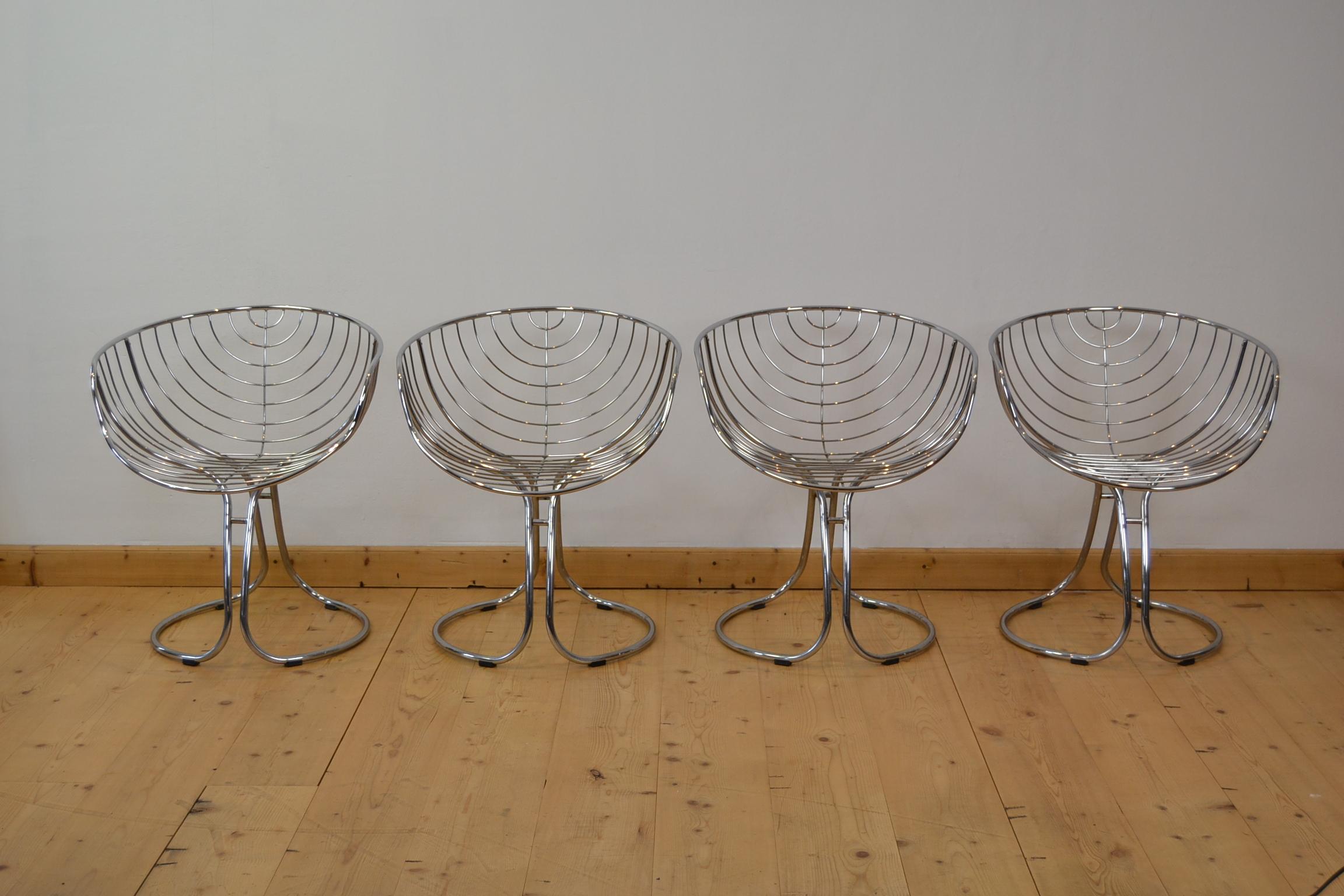 Stylish set of 4 iconic Chromed Metal ' Pan Am ' Armchairs, circa 1960.
These Modern Chairs were Designed for 
