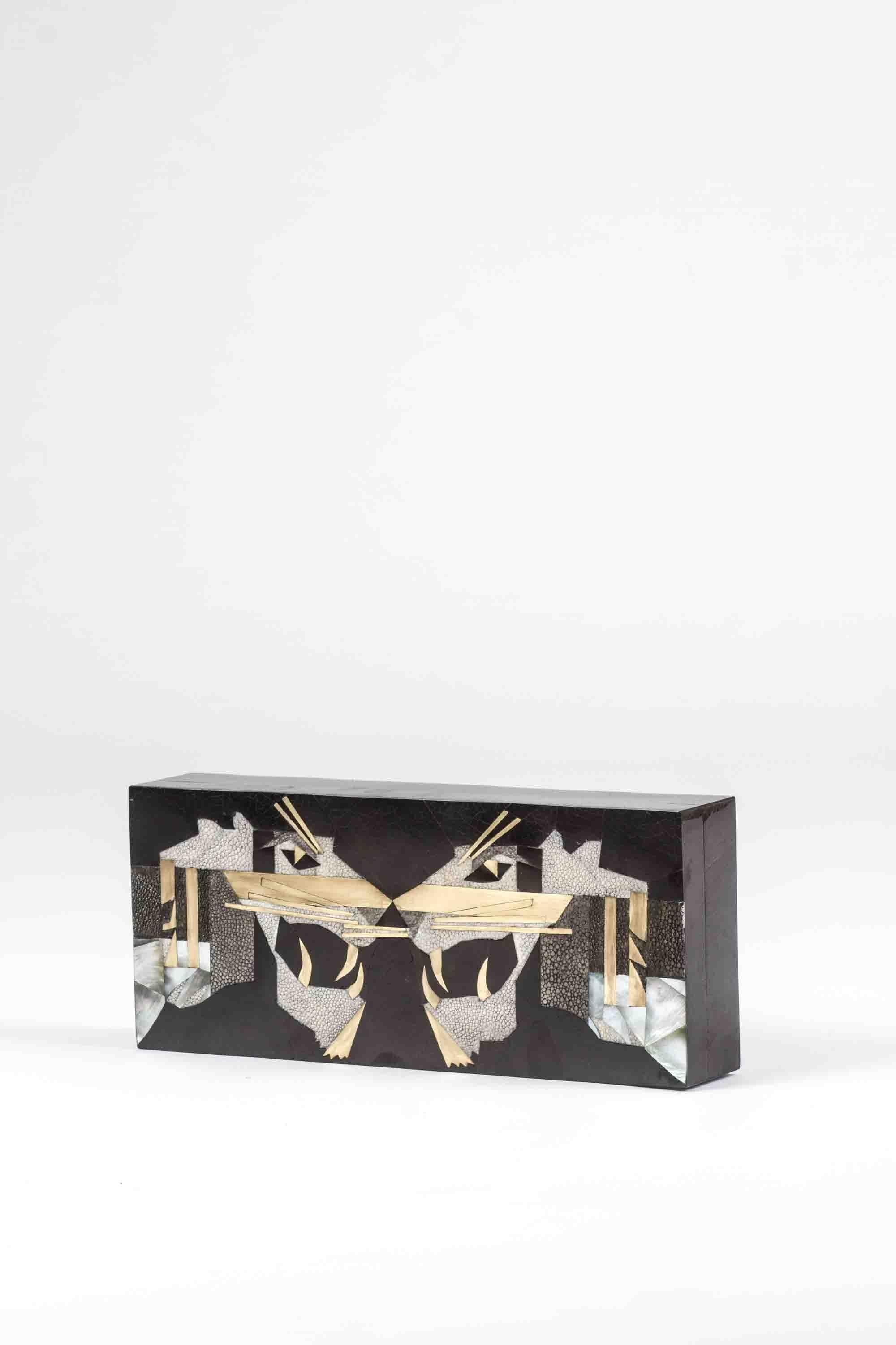 The Panther-themed accessories by Kifu Paris are a fun and bold set of accessories for your home. Inlaid in a mixture of shagreen , pen shell and bronze-patina brass these pieces demonstrate the incredible hand-craftsmanship of KIFU PARIS artisans.