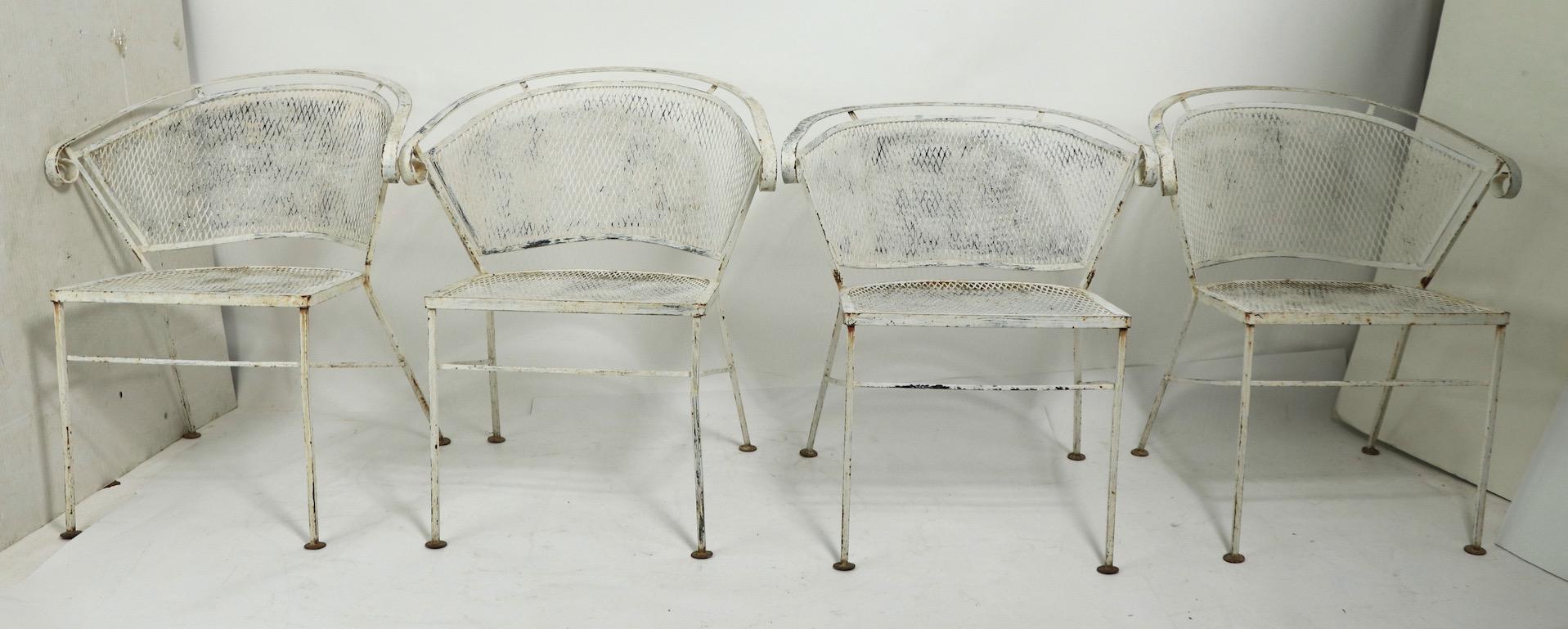 Nice set of 4 garden, patio dining chairs, attributed to Salterini. The chairs are structurally sound and sturdy, they are currently in later white paint finish, which shows significant cosmetic wear, please see images. If you look closely, you
