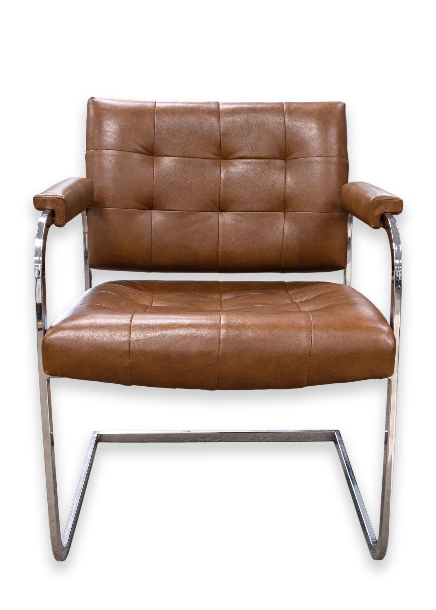 A pair of Patrician Furniture Company cantilever chairs. A wonderful set of brown tufted leather and chrome cantilever chairs. These beautiful chairs have padded armrests, seats and backs. They are super comfortable and super stylish. A really