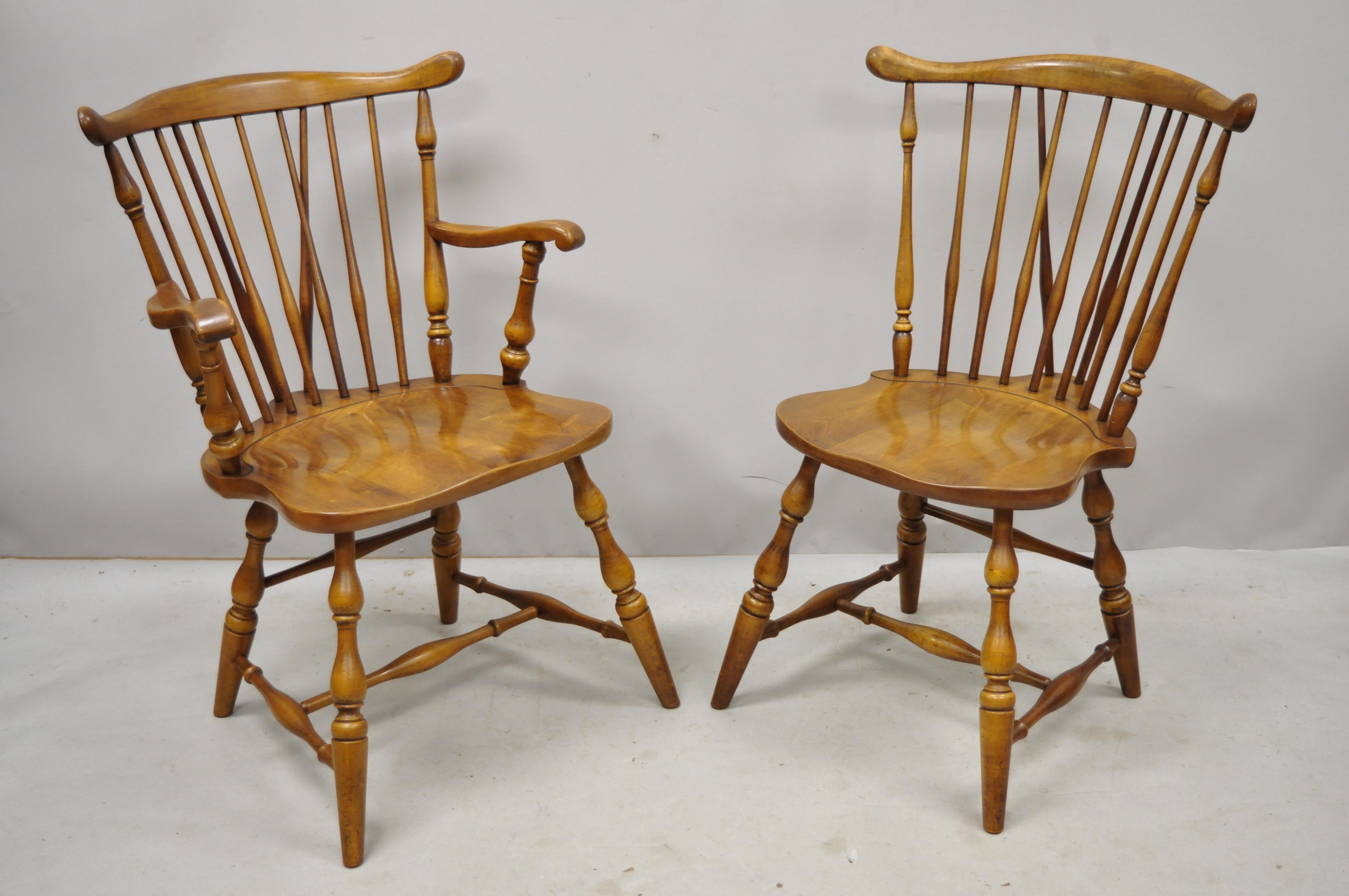 Set of 4 Pennsylvania house rock maple wood colonial Windsor dining chairs. Listing features (2) armchairs, (2) side chairs, solid wood construction, beautiful wood grain, original stamp, quality American craftsmanship, great style and form, circa