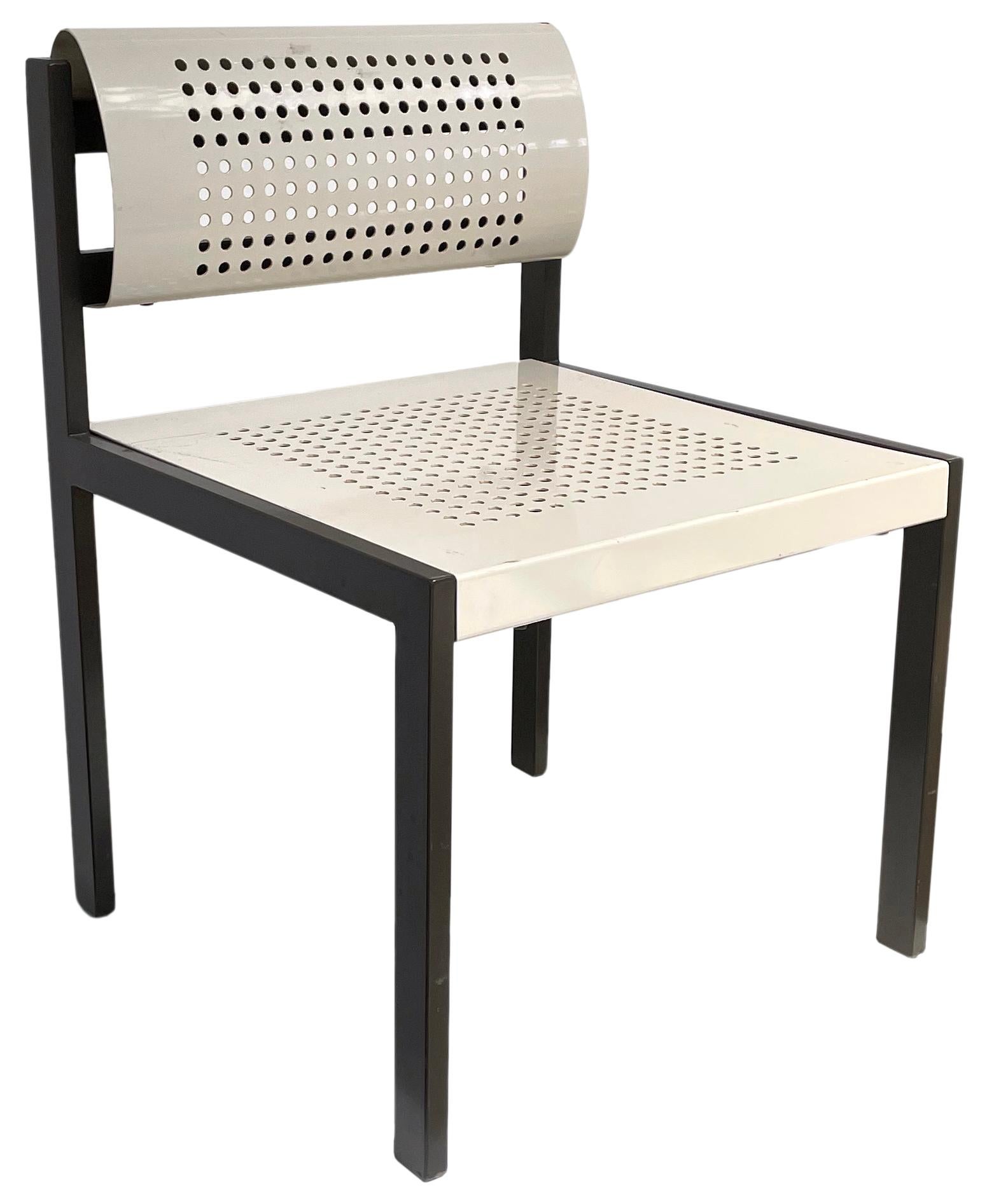 A fantastic set of 4 perforated steel chairs. Great Memphis-inspired, post-modern style; well-proportioned and heartily-built in a minimal ecru-and-black palette. Possibly intended for some sort of institutional outdoor use, they could easy add to a