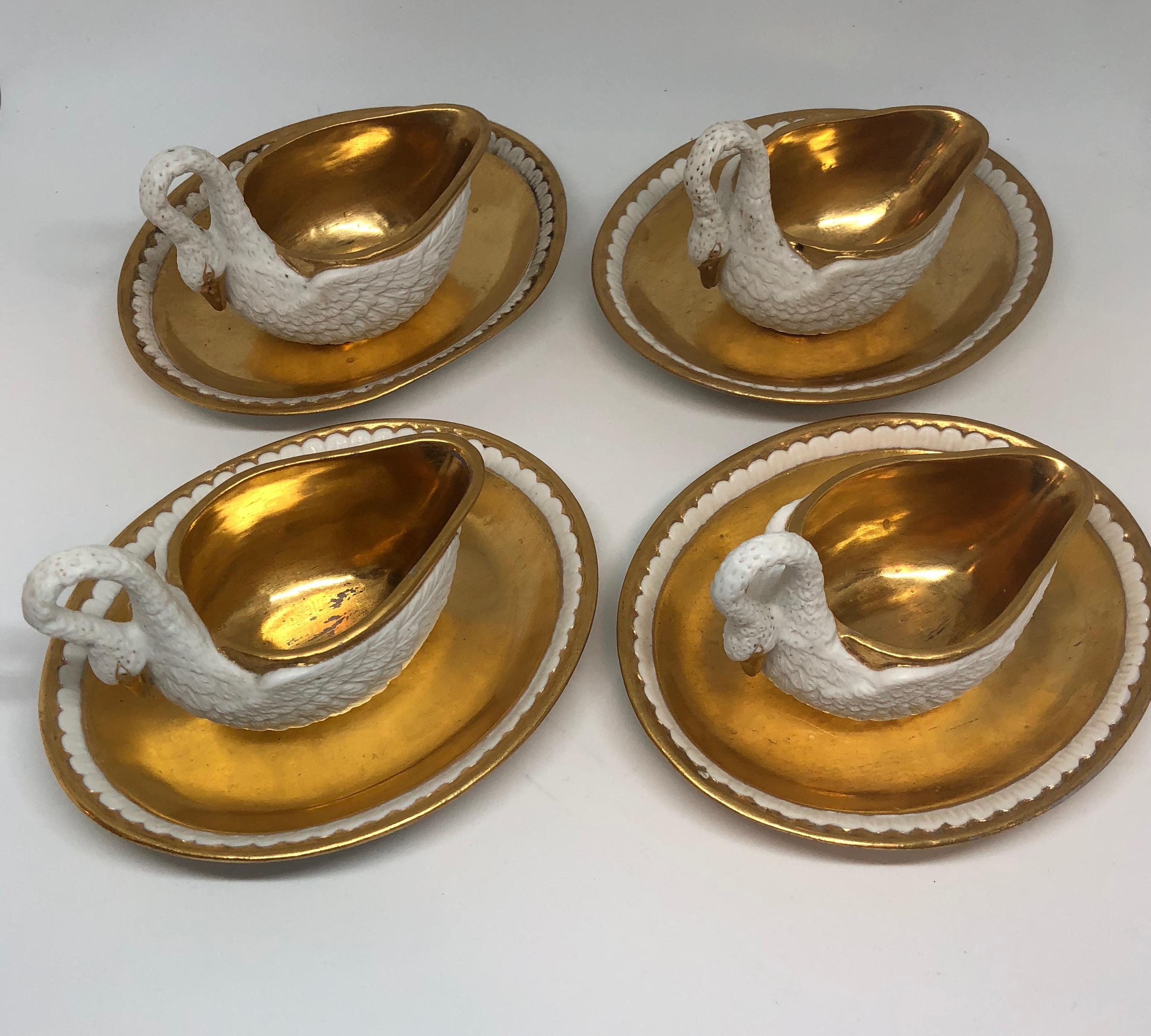 Set of 4 period Empire Bisque Porcelain and gilt swan cups, sold as two pairs, each pair listed at $1299 per pair.

 
