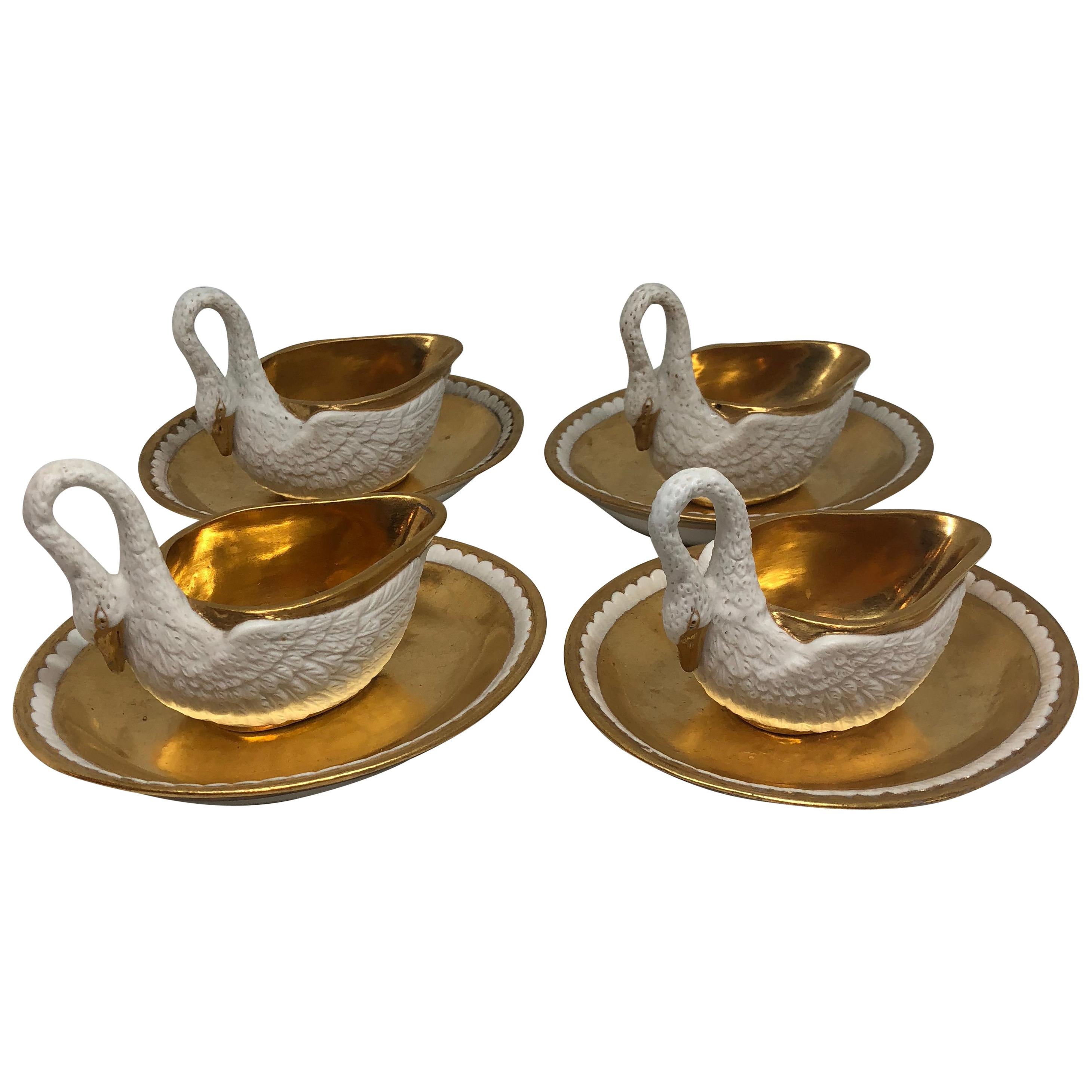Two Pairs of Period Empire Bisque Porcelain And Gilt Swan Cups