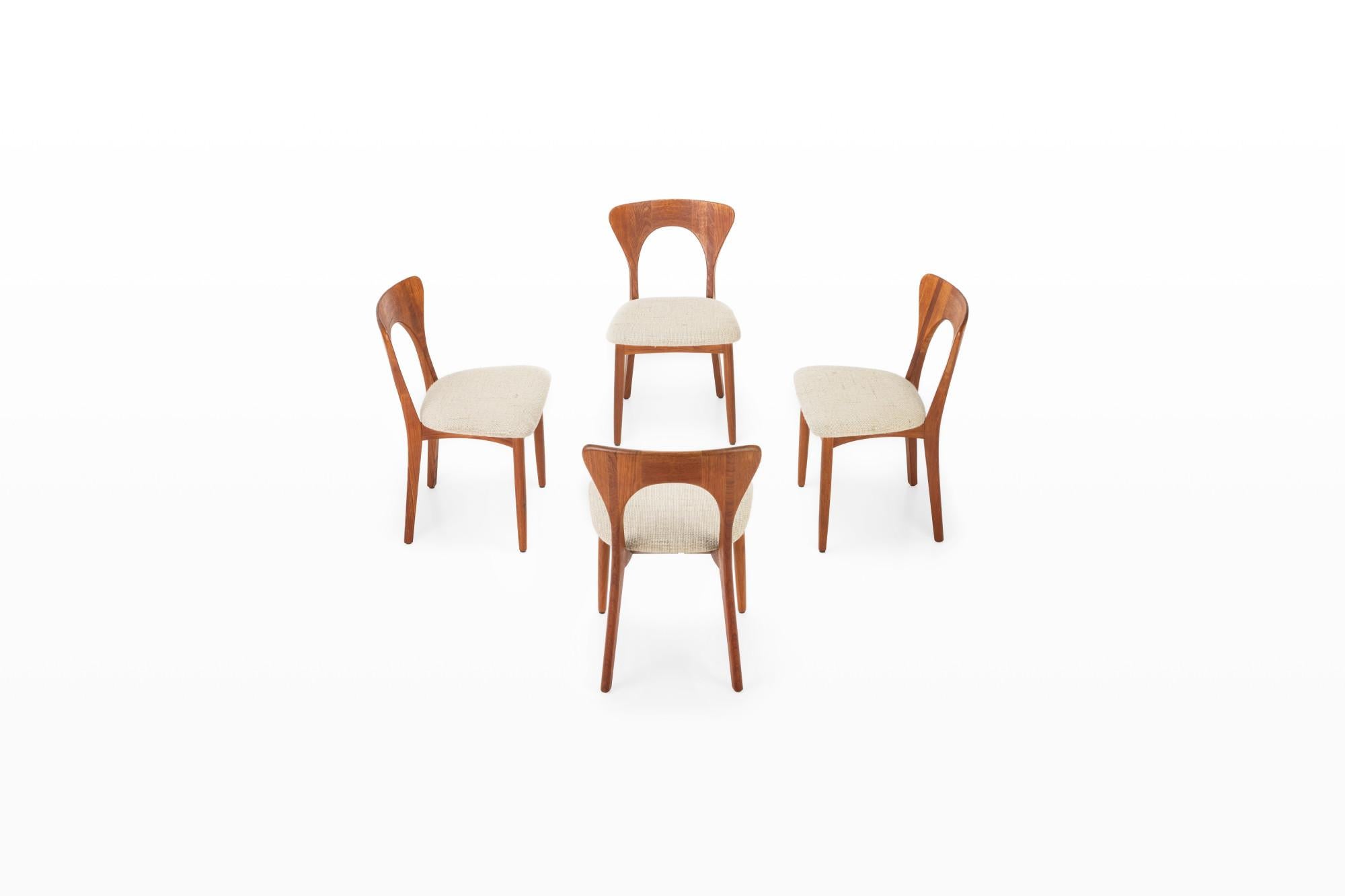 Very nice set of four vintage 'Peter' dining chairs. These chairs are designed by Niels Koefoed for Koefoeds Hornslet and manufactures in Denmark in the 1960s. The chairs have a teak frame and have a cream beige wool upholstery. All chairs are