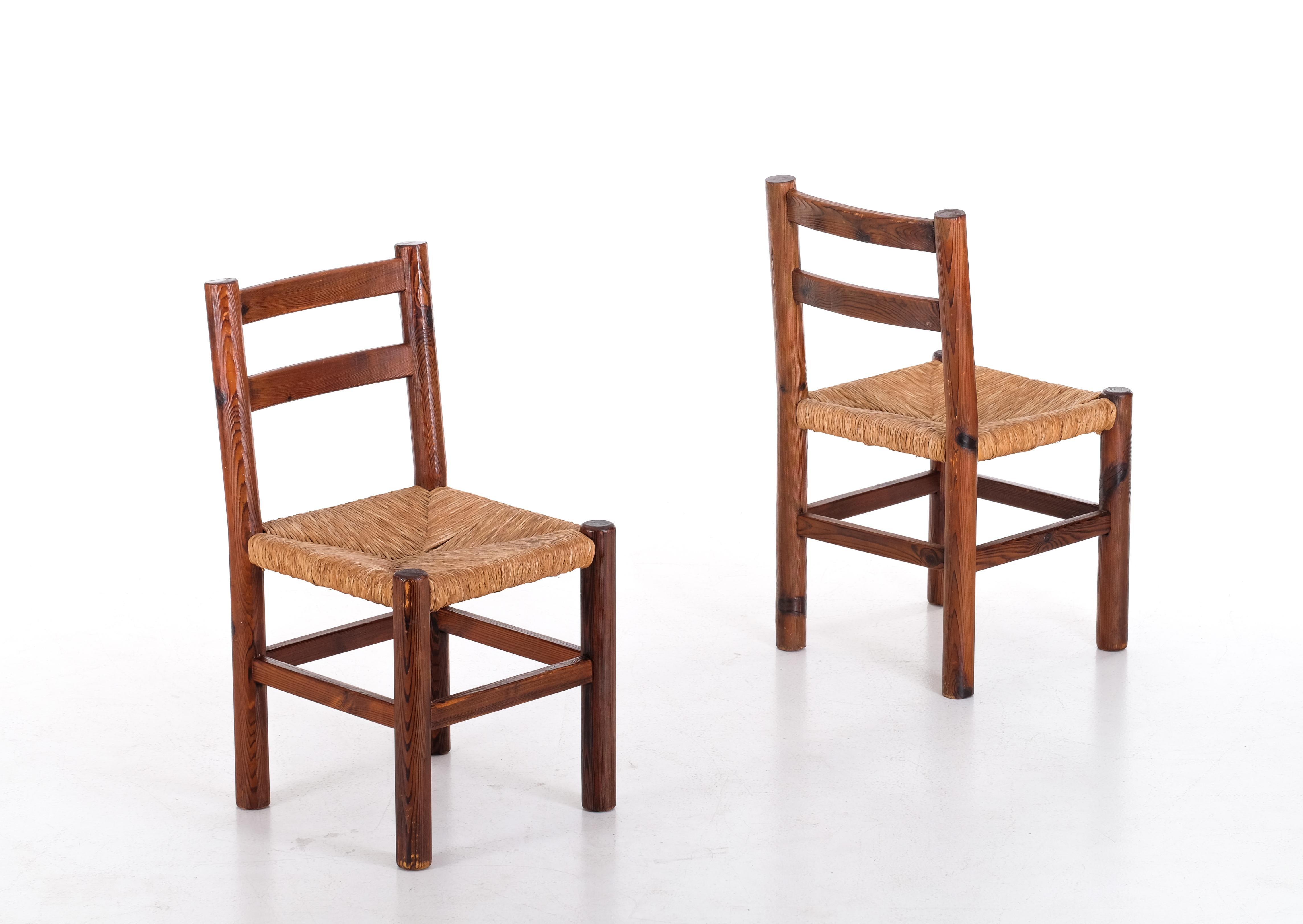 Set of 4 chairs in stained pine, 1960s.
