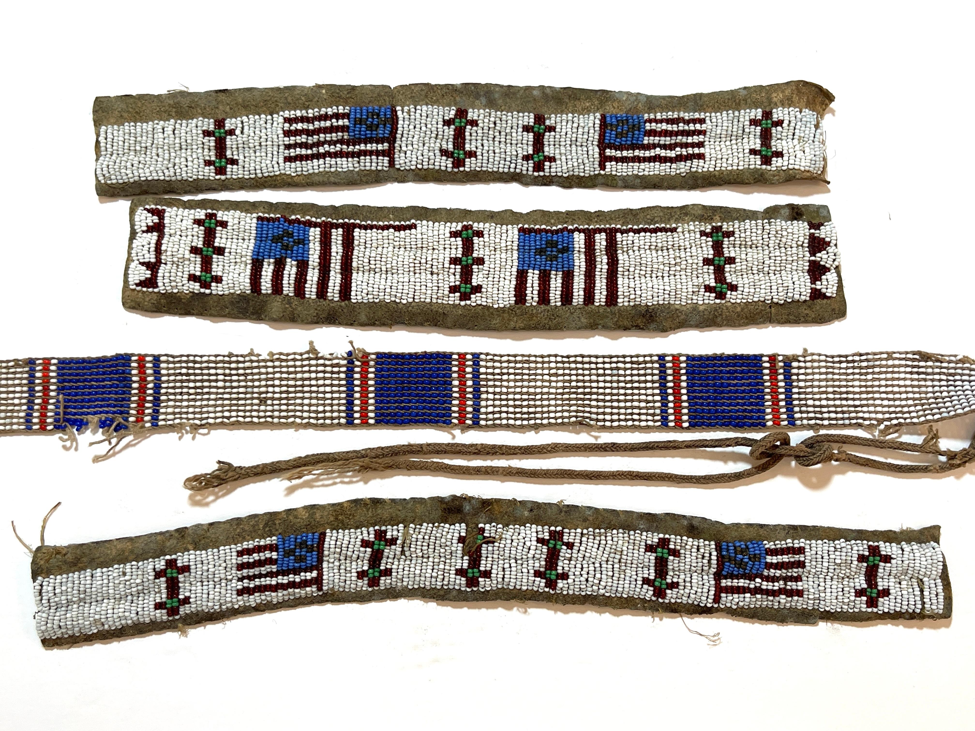 Set of 4 Plains Tribe American Flag Motif Ceremonial Beadwork Strips 
USA, circa 1900s
A rare collection of four Plains Tribe American Flag motif ceremonial beadwork strips dating back to the 1900s. Each piece is a stunning example of Native