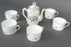 Set of 4 Porcelain Cups and Coffee Pot.