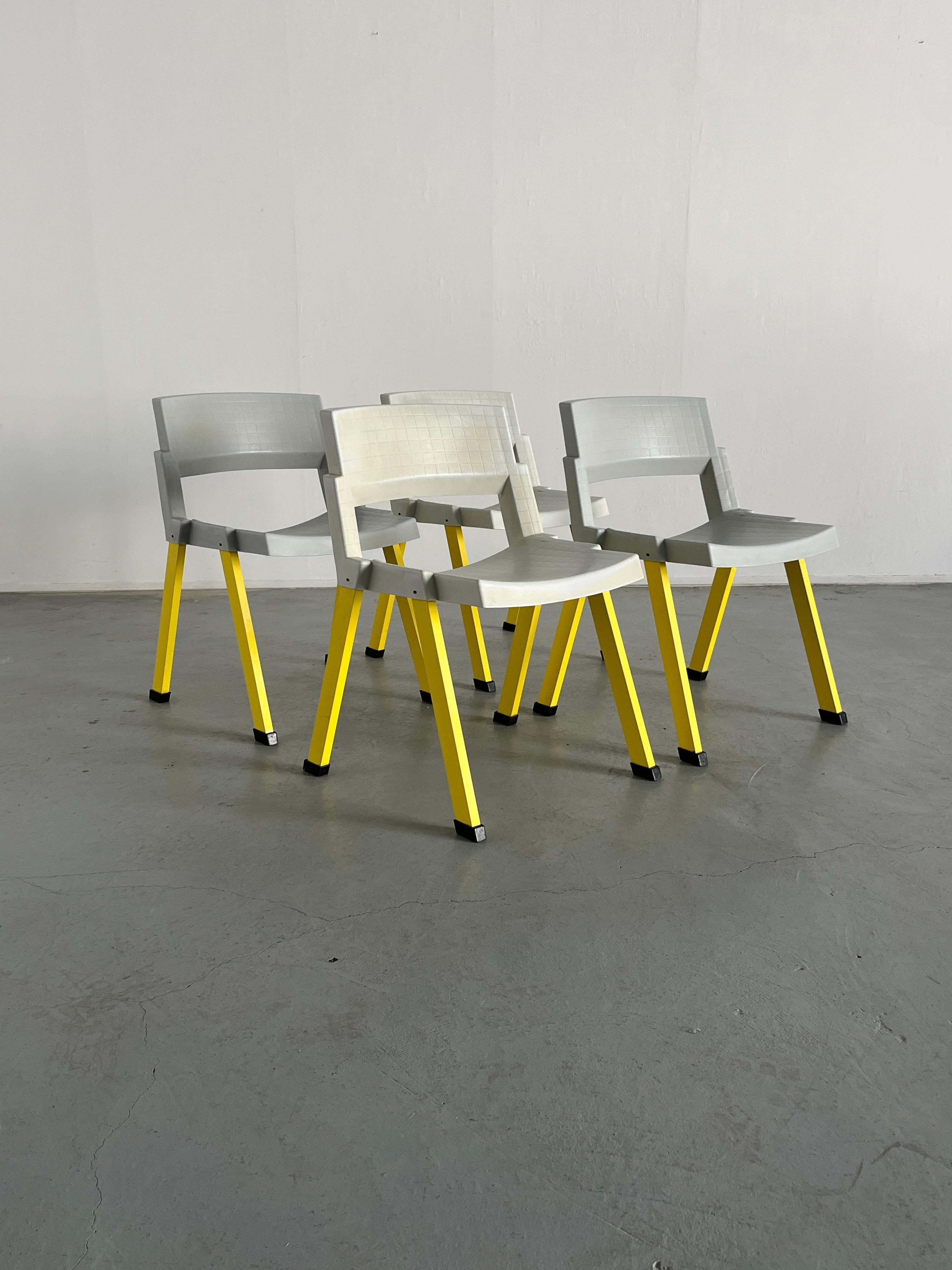 Set of four brightly colored plastic Memphis design postmodern chairs, designed by Paolo Orlandini and Roberto Lucci, produced in 1987 by Lamm S.P.A.
For outdoor or indoor use.
Stackable.
Labeled.

Overall in good vintage condition with expected