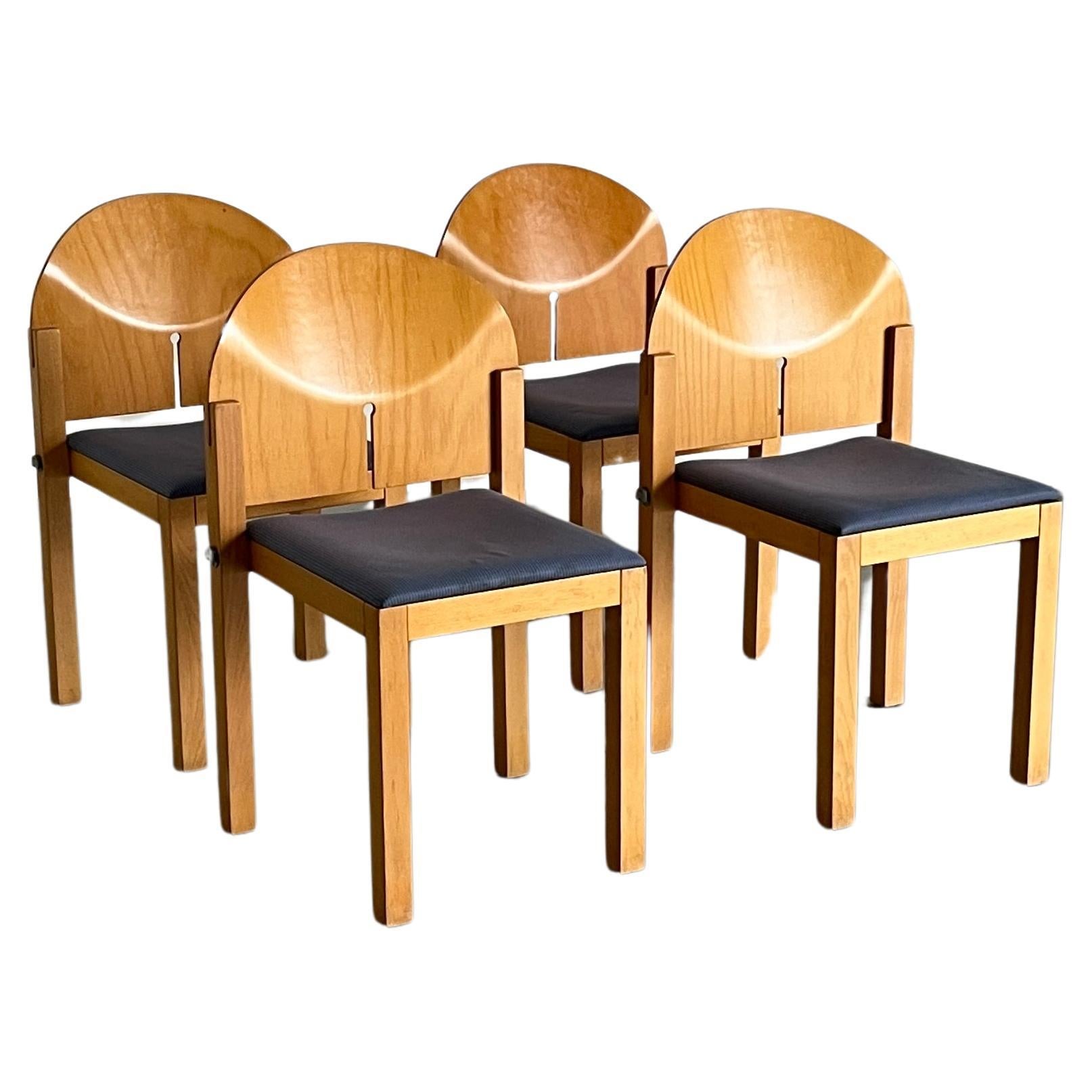 Ensemble de 4 chaises de salle à manger postmodernes sculpturales en bois par Arno Votteler, années 1980