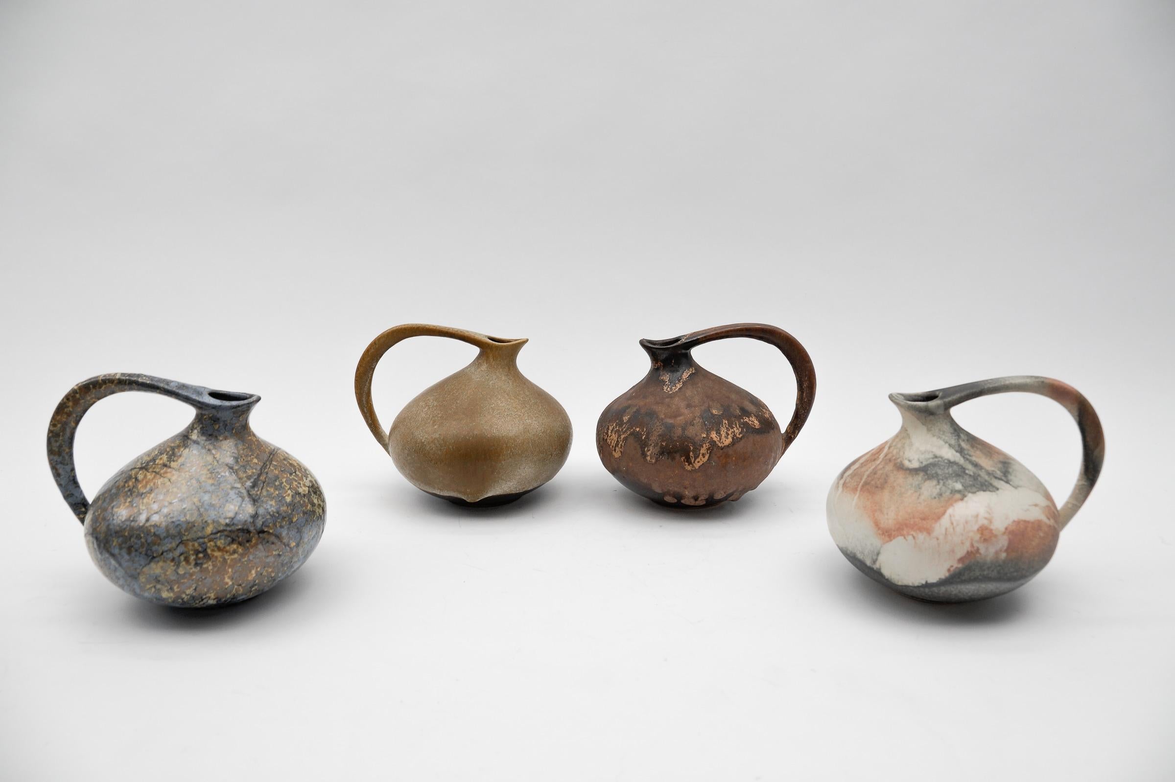 Set of 4 Pottery Vases 